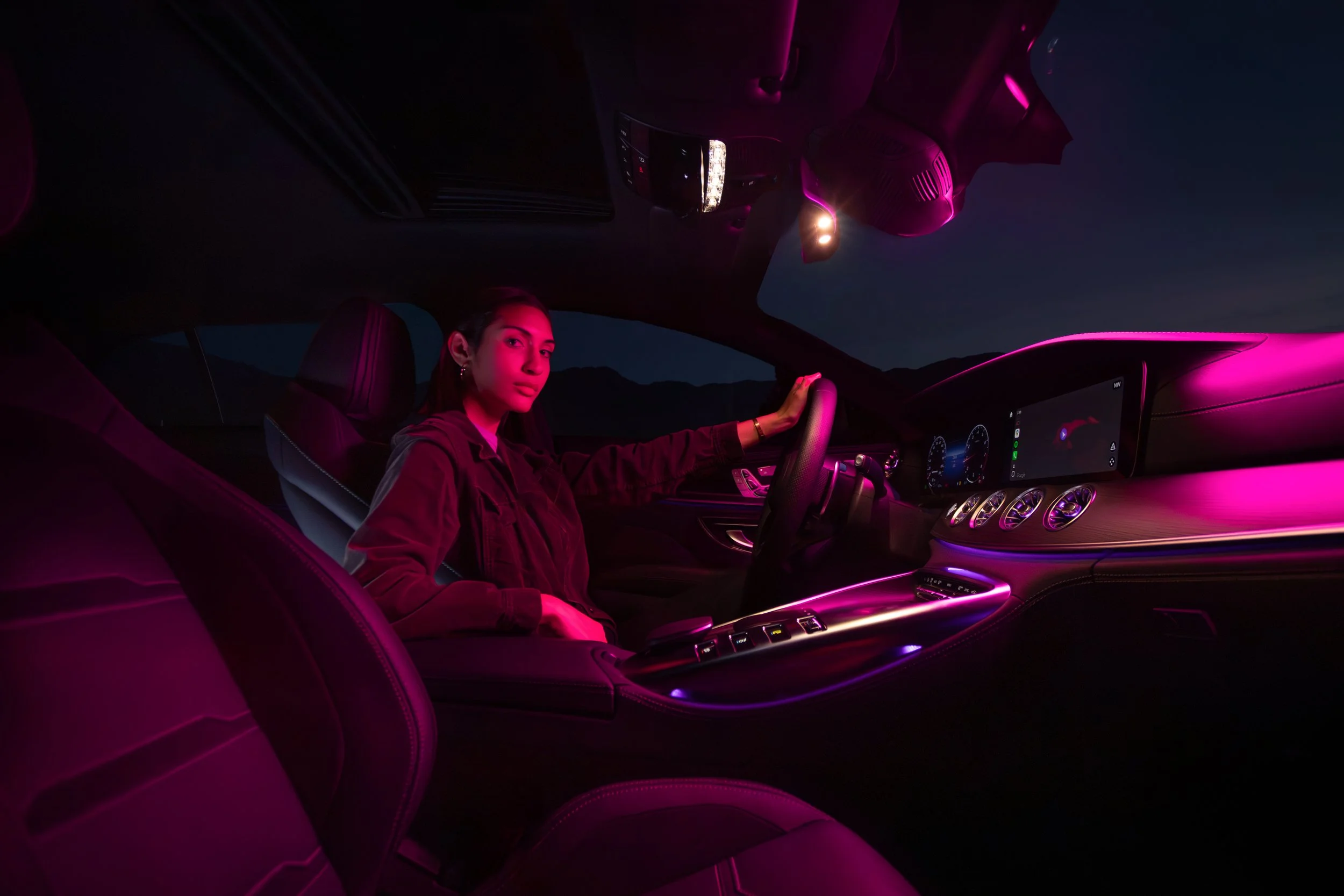 Mercedes-AMG S 63 interior lifestyle photography featuring talent and ambient cabin lighting