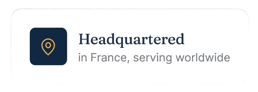 A logo with a map pin icon next to the text 'Headquartered in France, serving worldwide'.