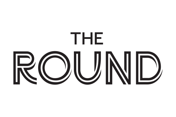 Text reading 'The Round' on a black background. This is a premium performing arts centre based in Melbourne's east.
