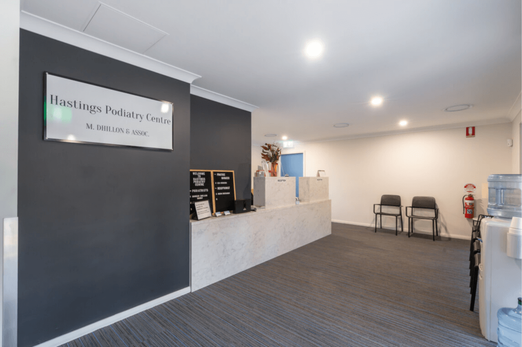 Lobby of Hastings Podiatry Centre with reception desk and waiting area.
