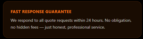 Close-up of a black sign with orange and white text offering a fast response guarantee for quote requests within 24 hours.