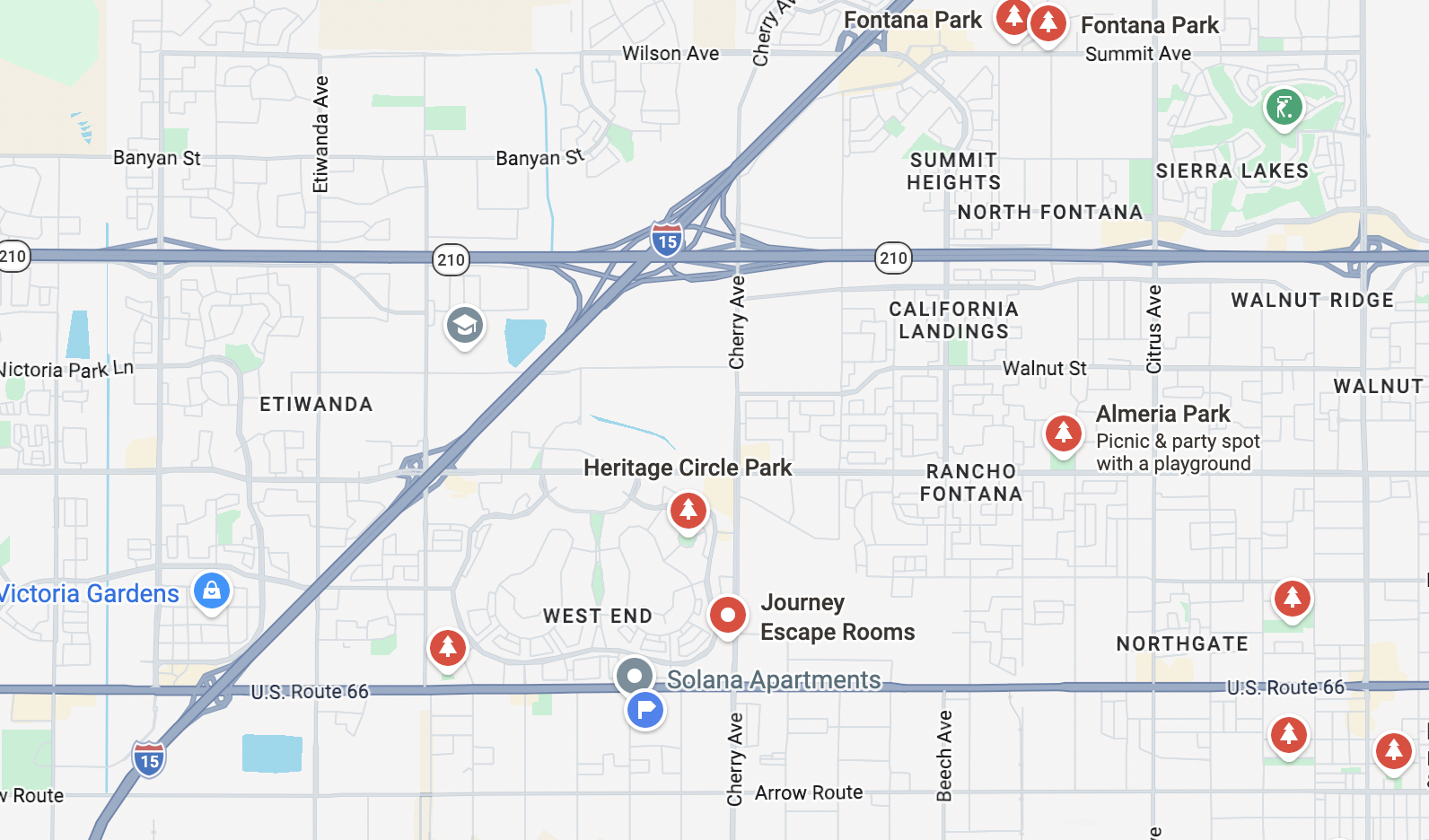 Map of a neighborhood with parks, apartments, and streets, including U.S. Route 66 and I-15, showing various locations and points of interest in North Fontana, California.