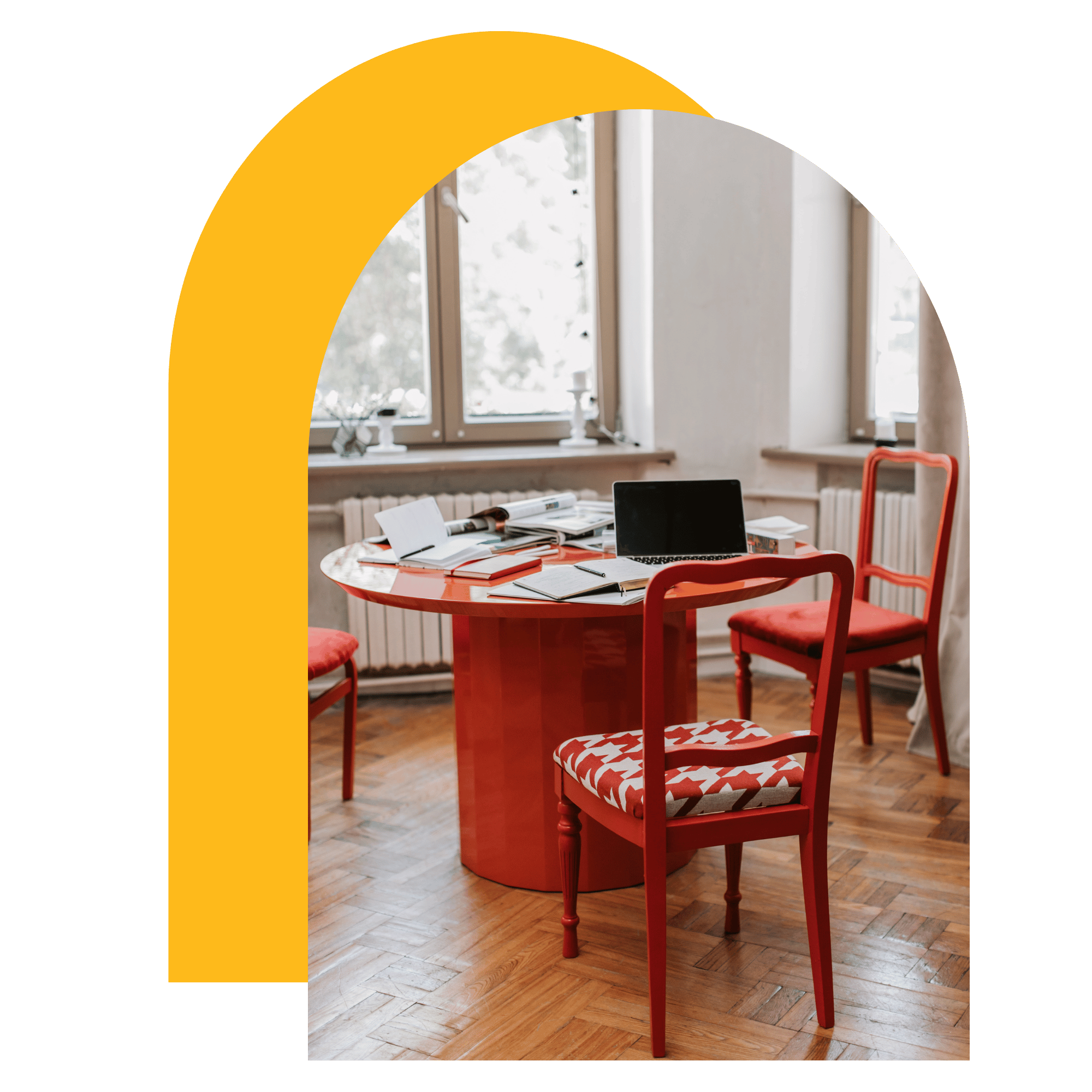 Warm café workspace with red chairs representing relaxed real-life coaching settings