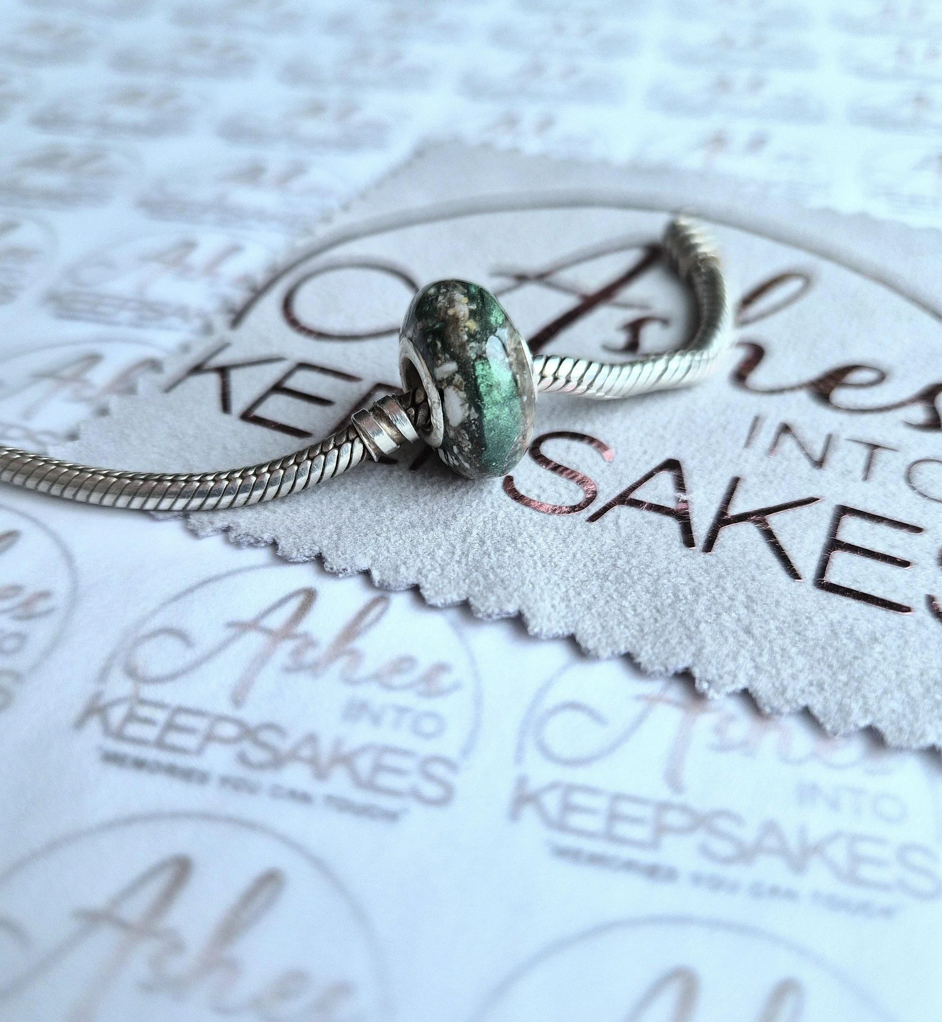 ashes charms green.jpg