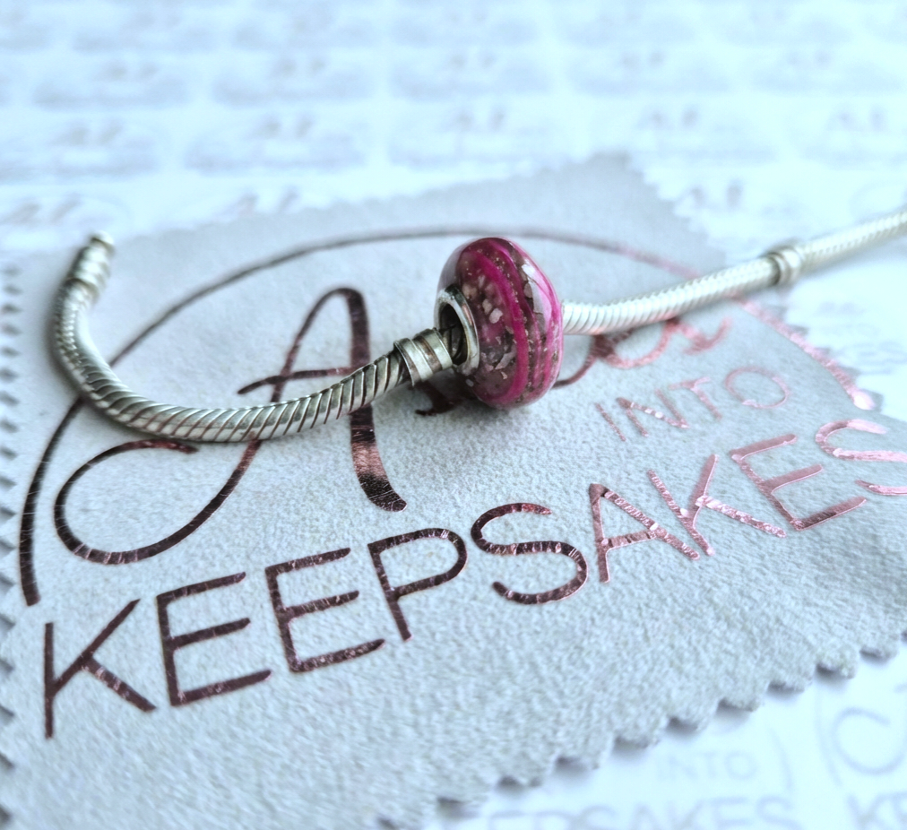 ashes charm pink.png