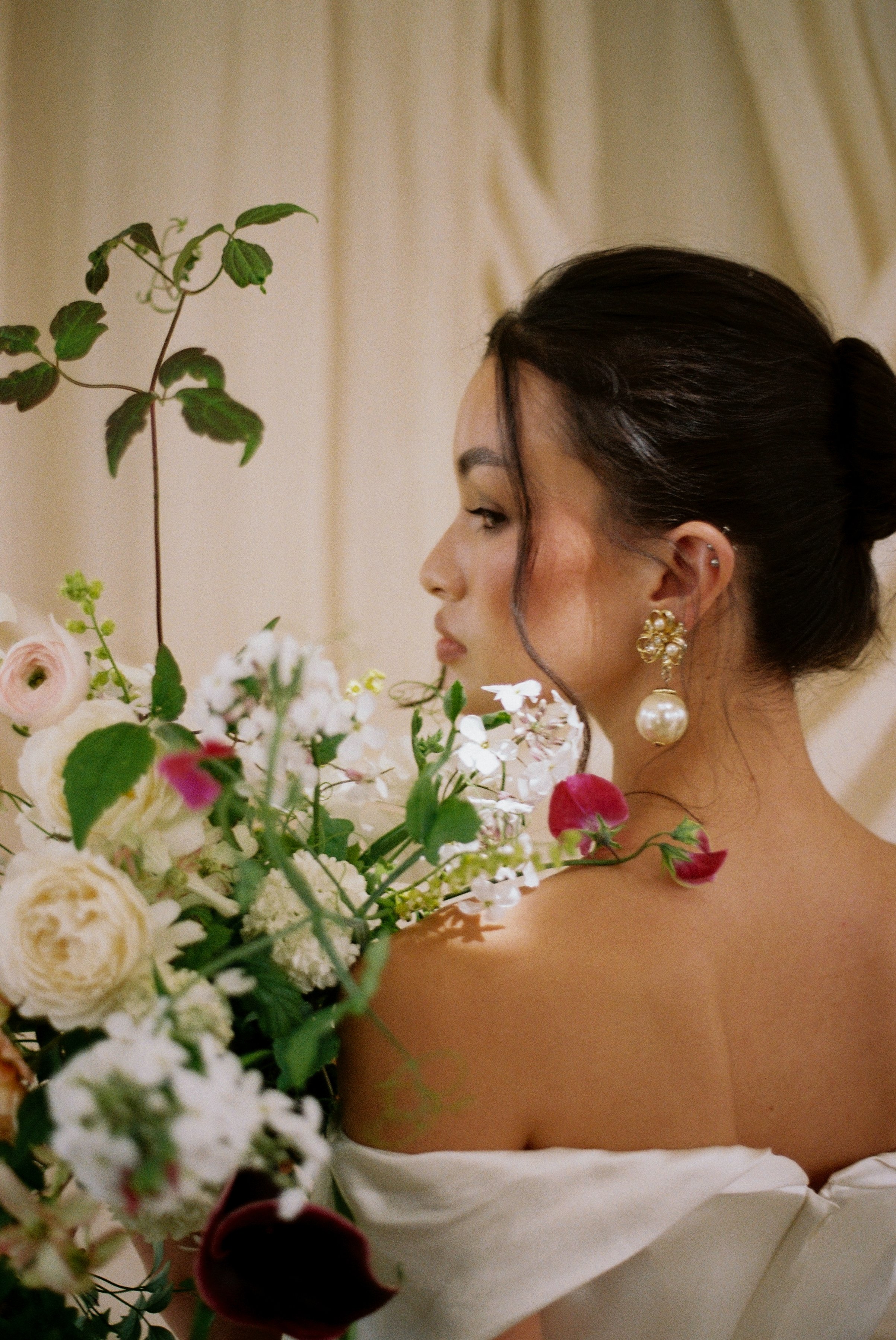 Bride in a Vivienne Westwood wedding gown at Green Trees Estate Folly, photographed on 35mm film