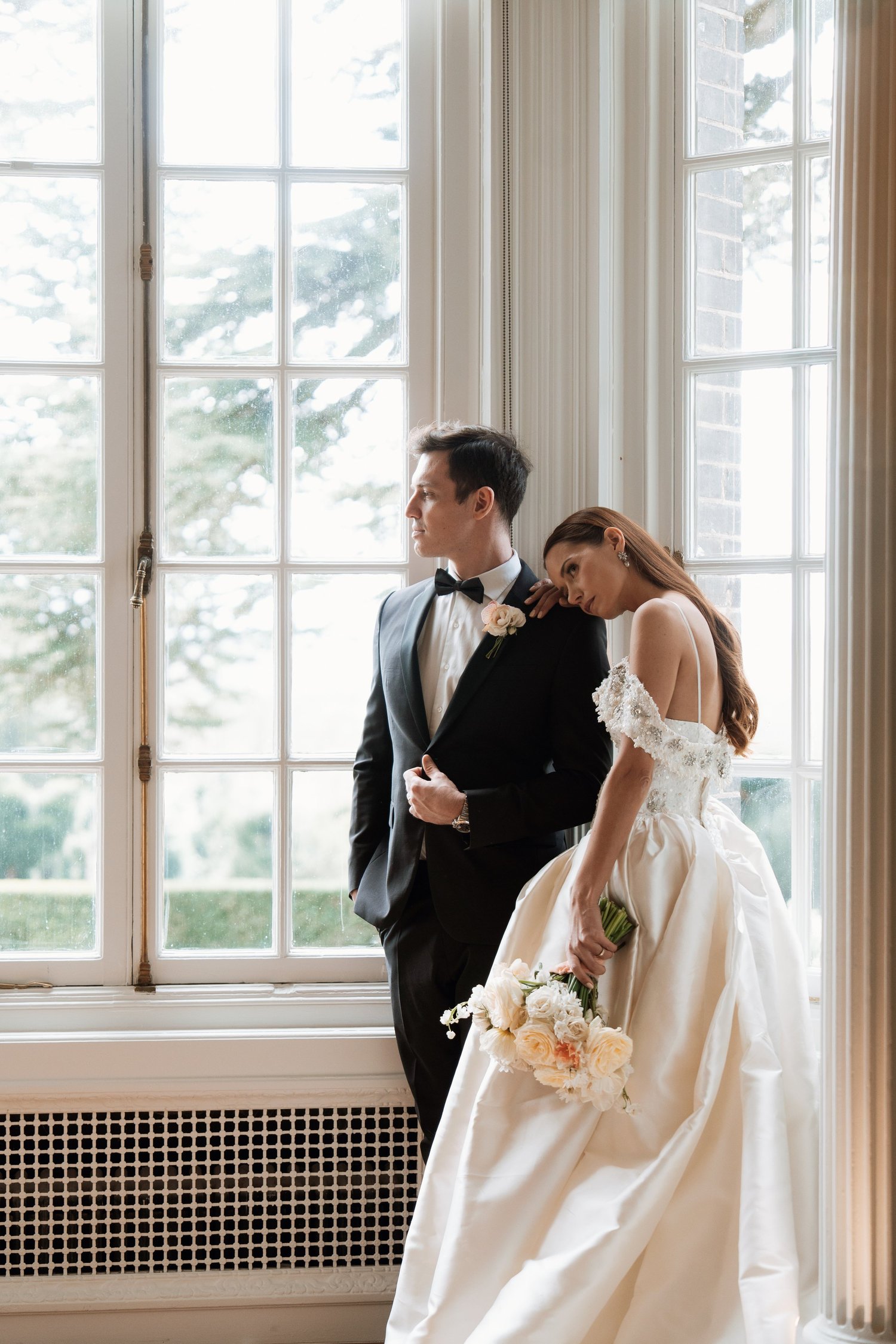 Couple in a moody editorial wedding portrait