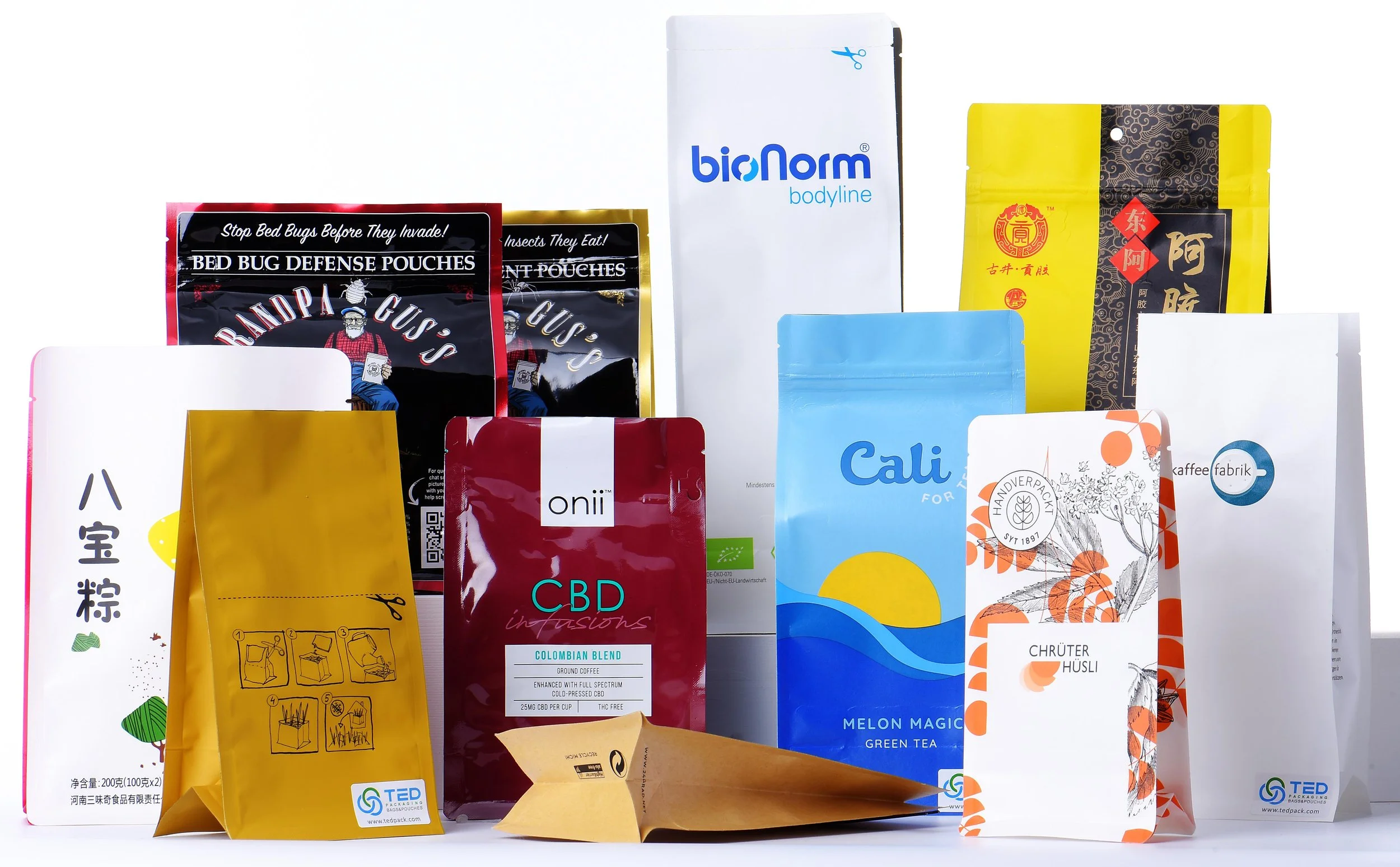 A collection of various colorful snack, tea, and supplement packages, including brands like bioNorm, CBD, Cali, and others, arranged upright against a white background.