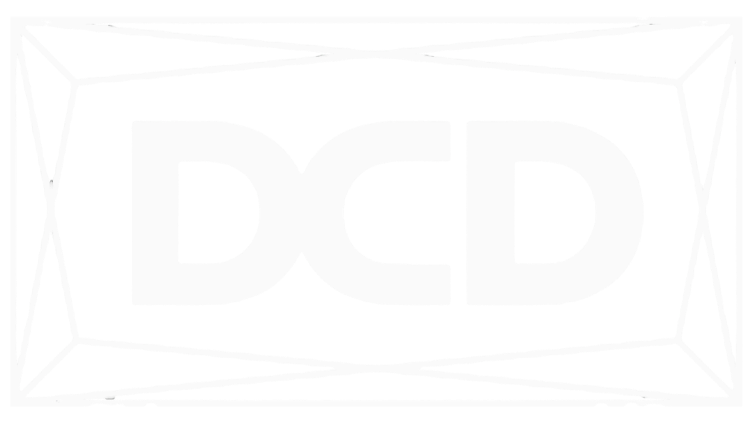 Black and white logo with the letters DCD inside a rectangular border.