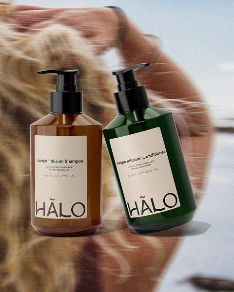 Product packaging for Halo Scalp Detox Elixir featuring a blurred woman in water reflected with text about the product, which contains tea tree oil, ginger root extract, and green clay.