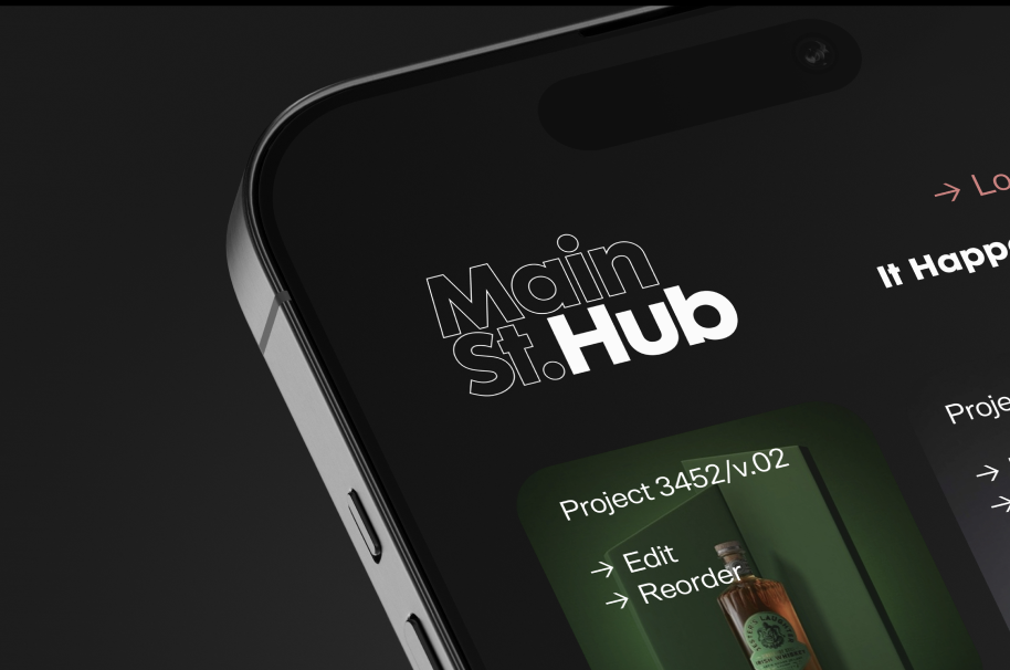 Close-up of a smartphone displaying the Main St. Hub app interface with project details and navigation options.