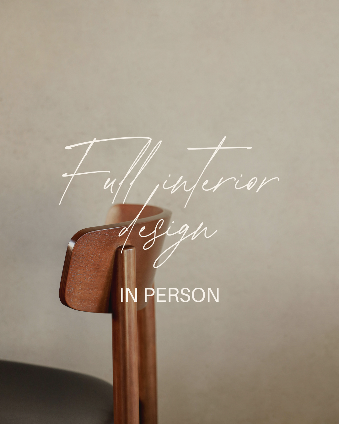 Close-up of a wooden chair with text overlay that reads 'Full interior design in person'