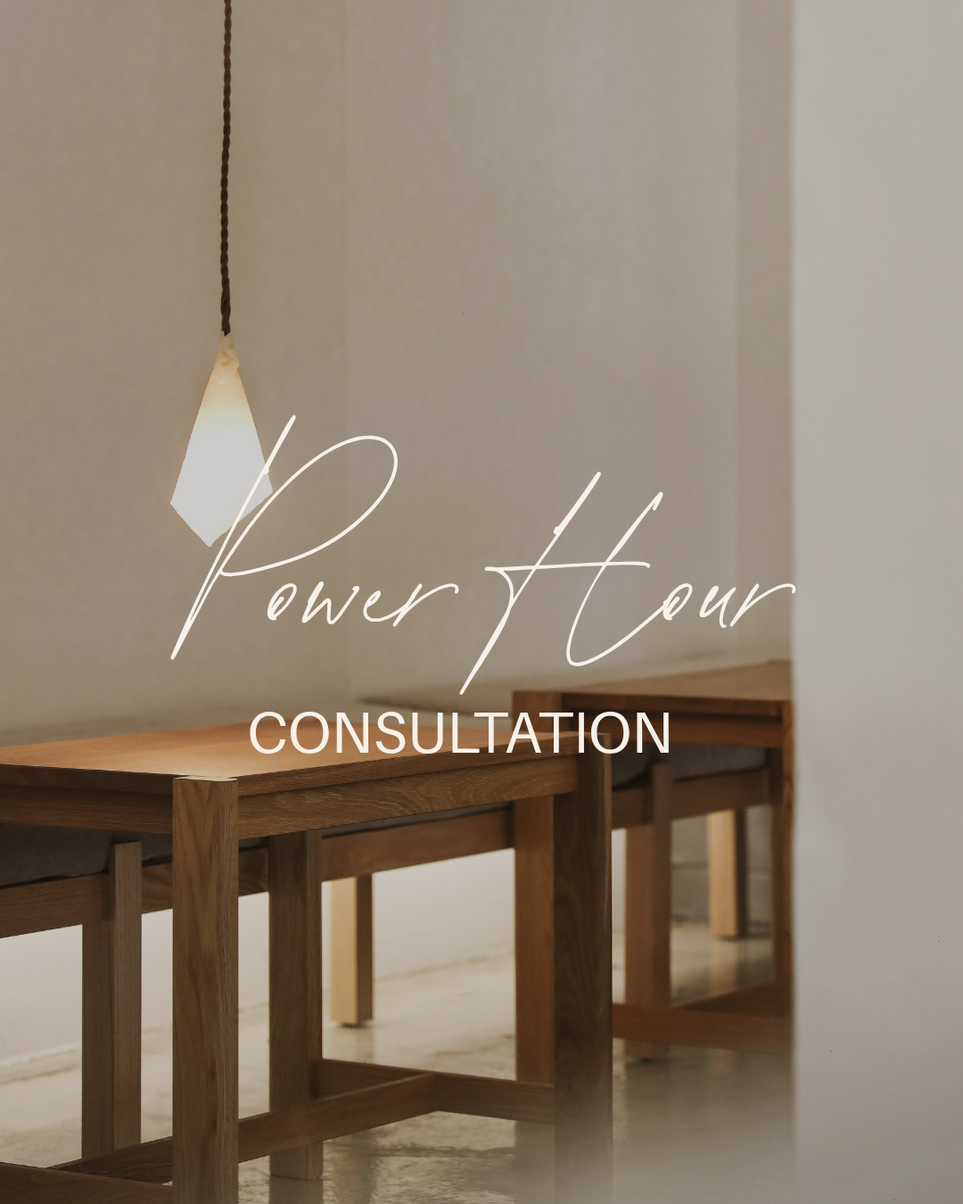 Text overlay on a photo of wooden chairs, reading 'Power Hour Consultation'.