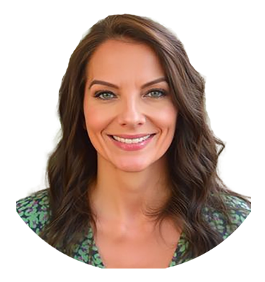 A smiling woman with shoulder-length brown hair, wearing a green patterned top.