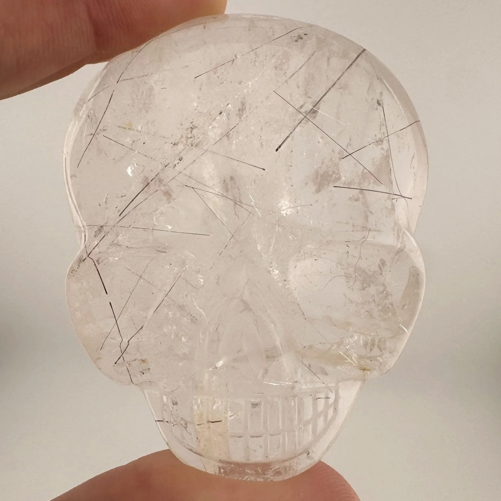 Leandro de Souza Red Rutile in Quartz Magical Child Palm Skull