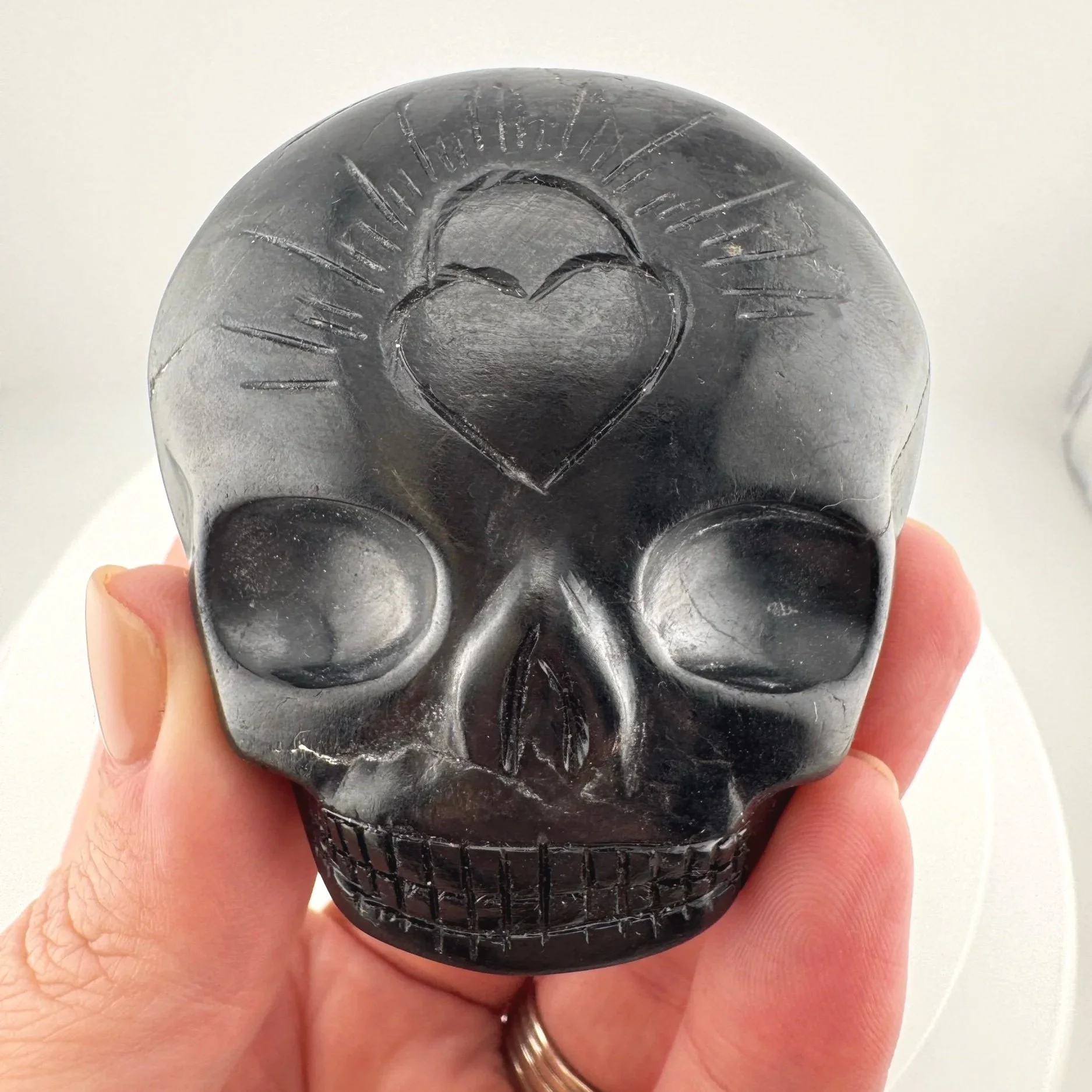 Leandro de Souza Purpurite Magical Child Palm Skull