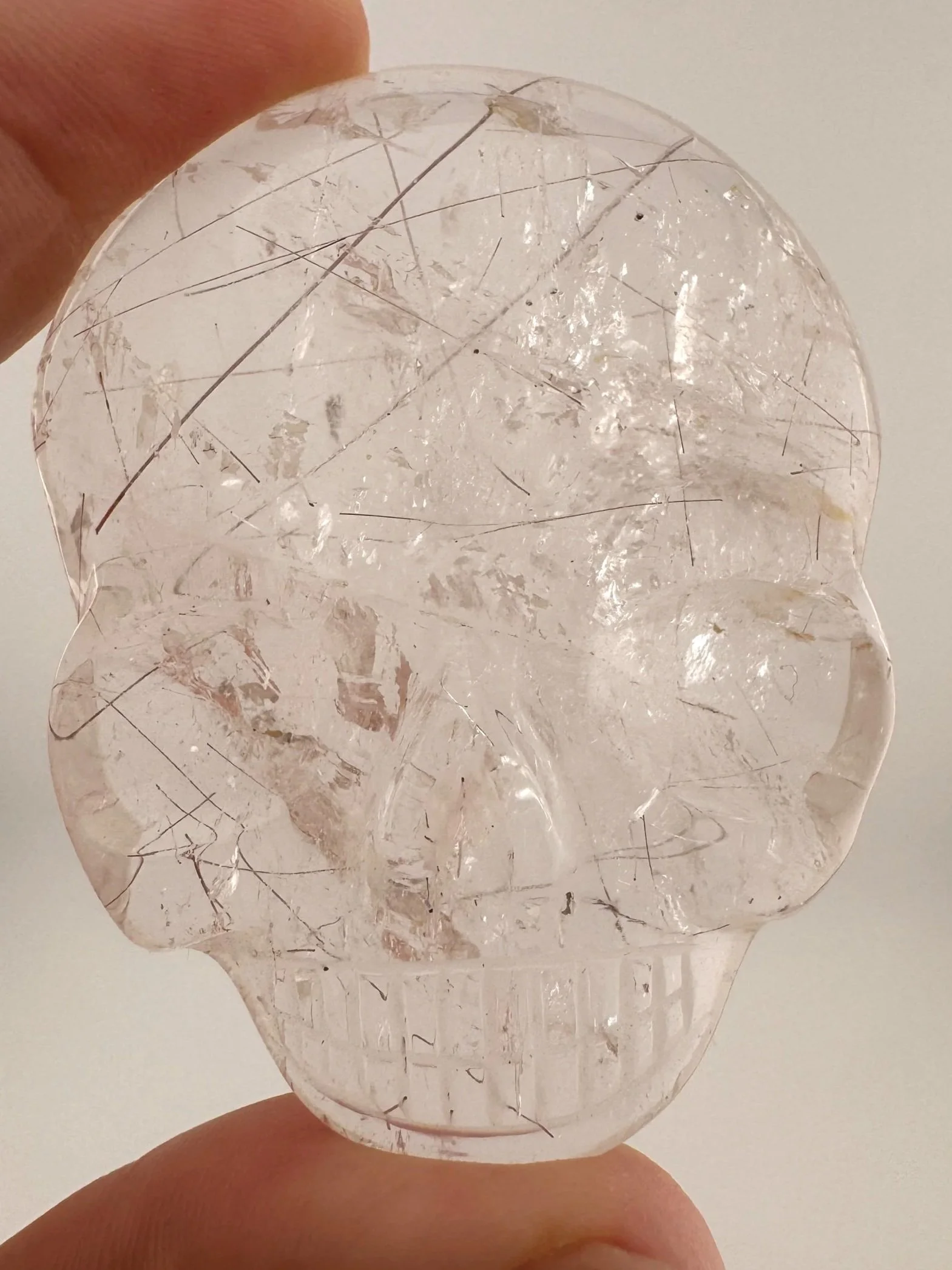 Leandro de Souza Red Rutile in Quartz Magical Child Palm Skull