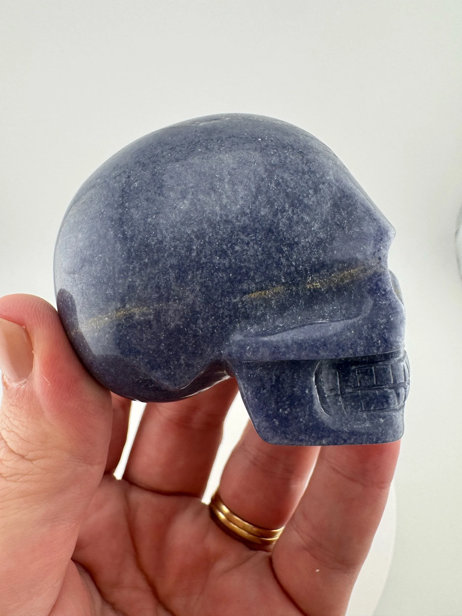 A Blue Aventurine Skull carved by Leandro de Souza