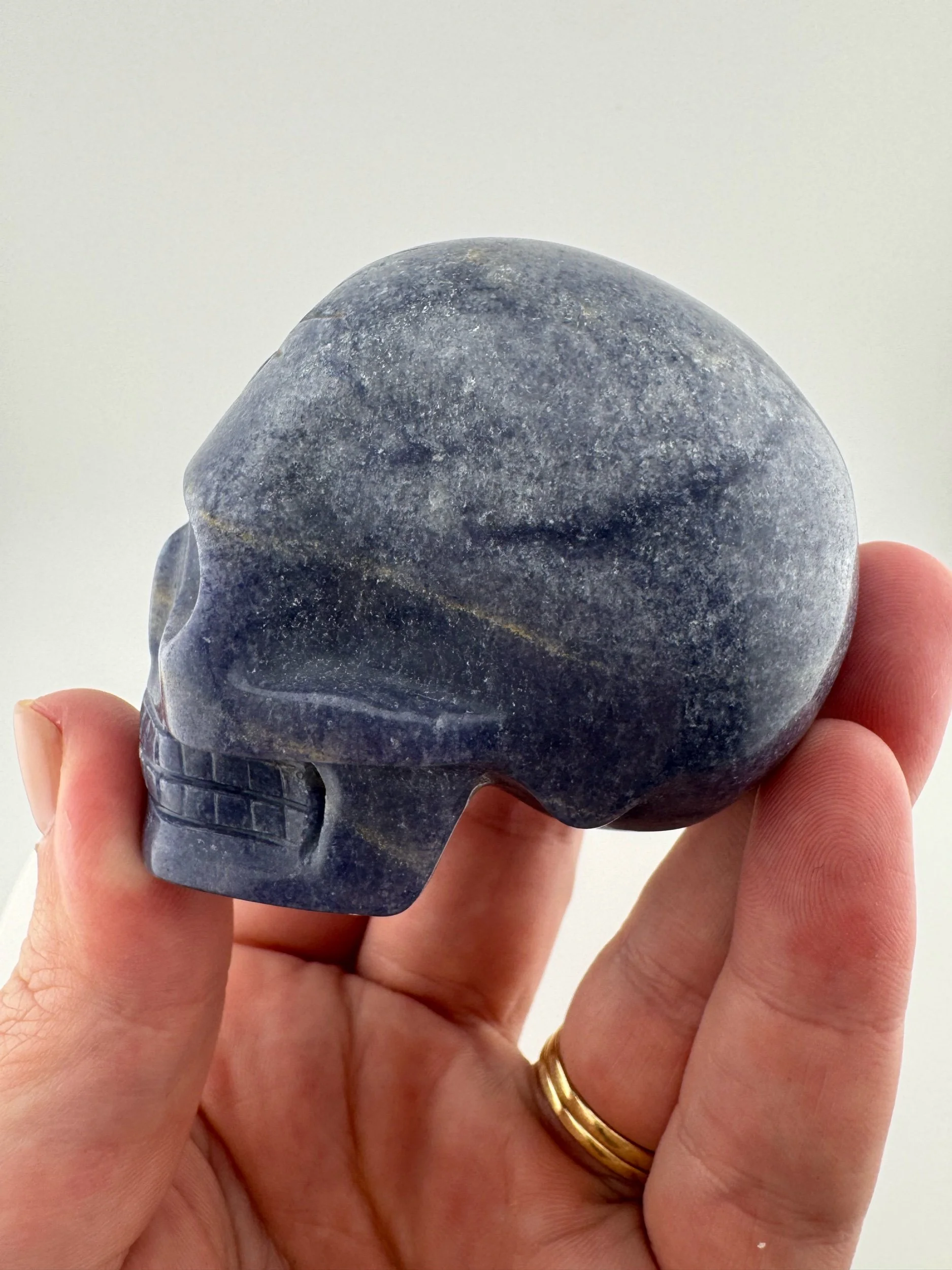 A Blue Aventurine Skull carved by Leandro de Souza