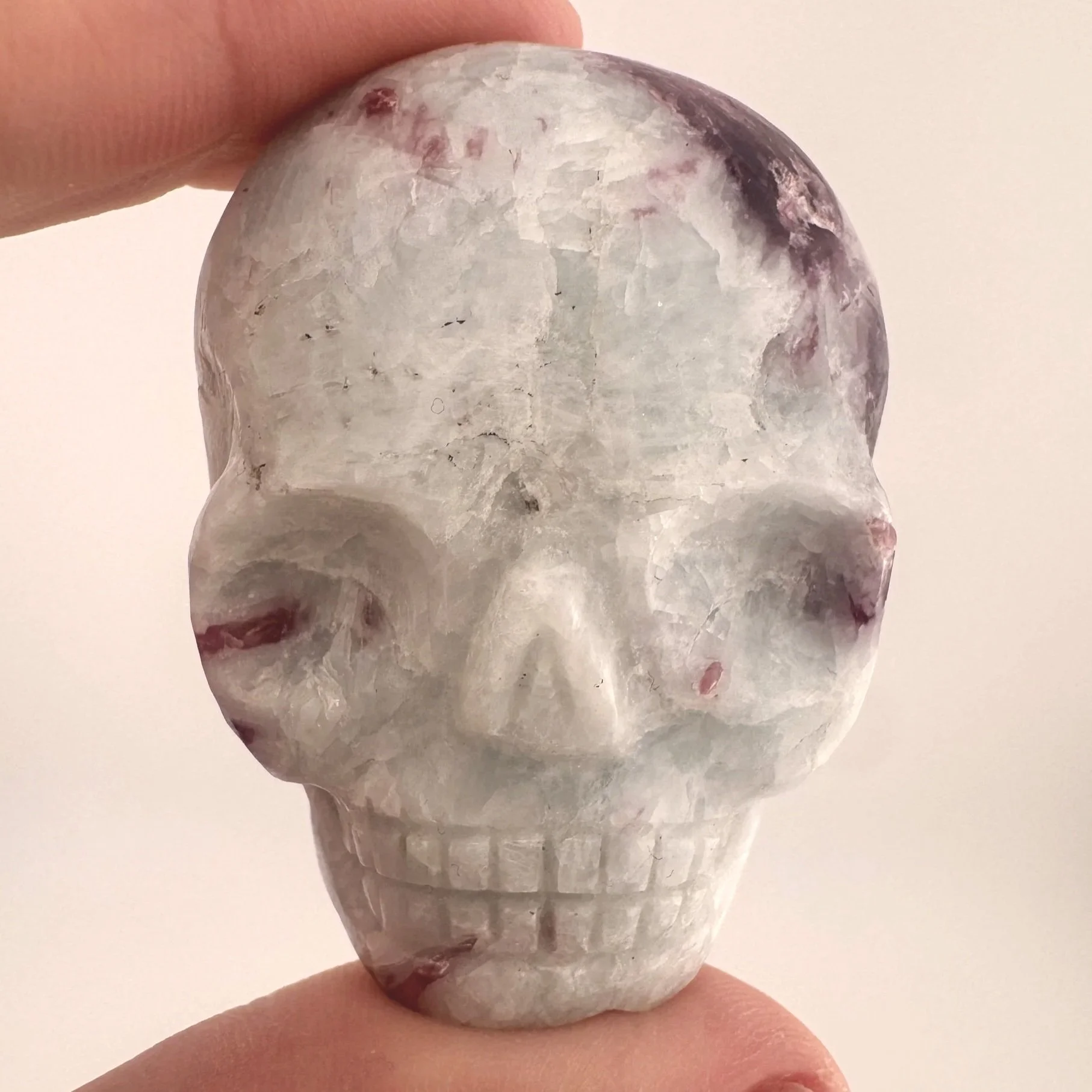 Leandro de Souza Paraiba Tourmaline in Feldspar Palm Skull