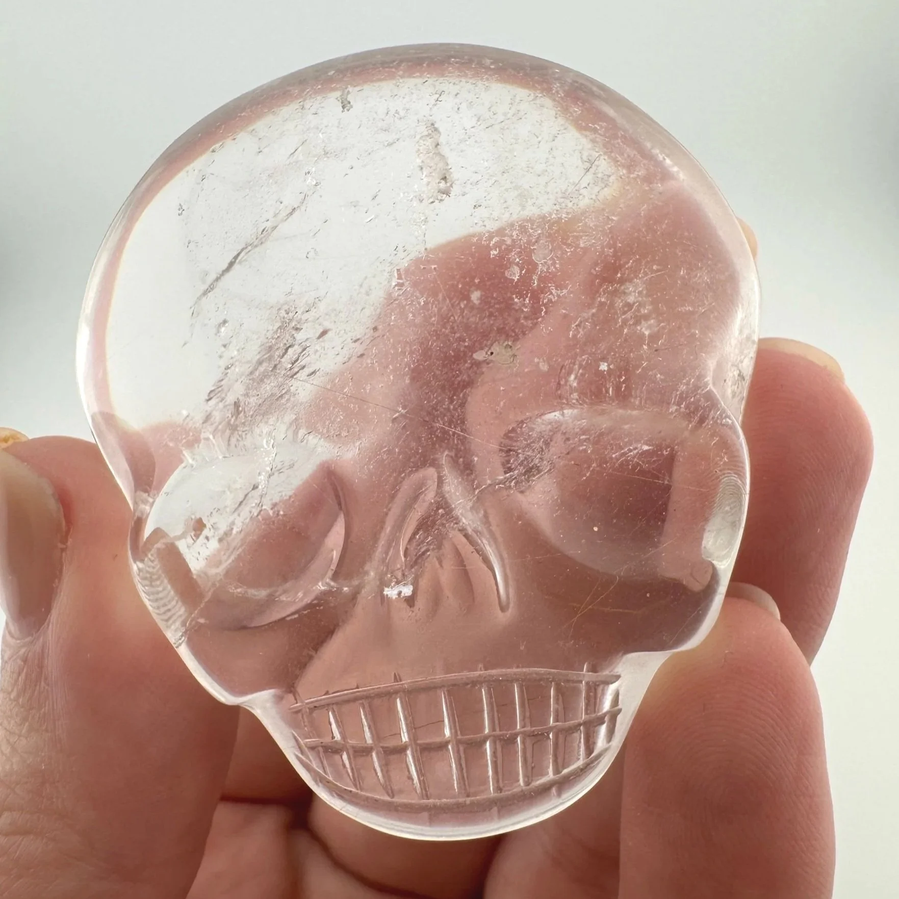 Leandro de Souza Red Rutile in Quartz Magical Child Palm Skull