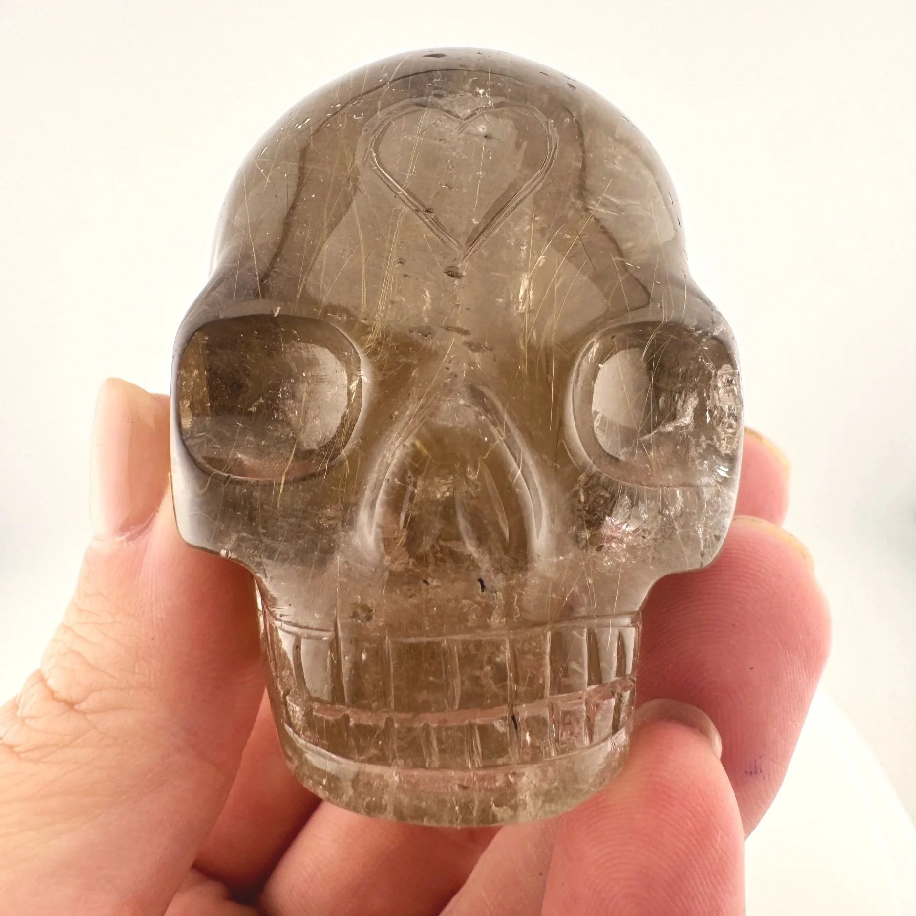 Leandro de Souza Golden Rutile in Smoky Quartz Mayan Skull