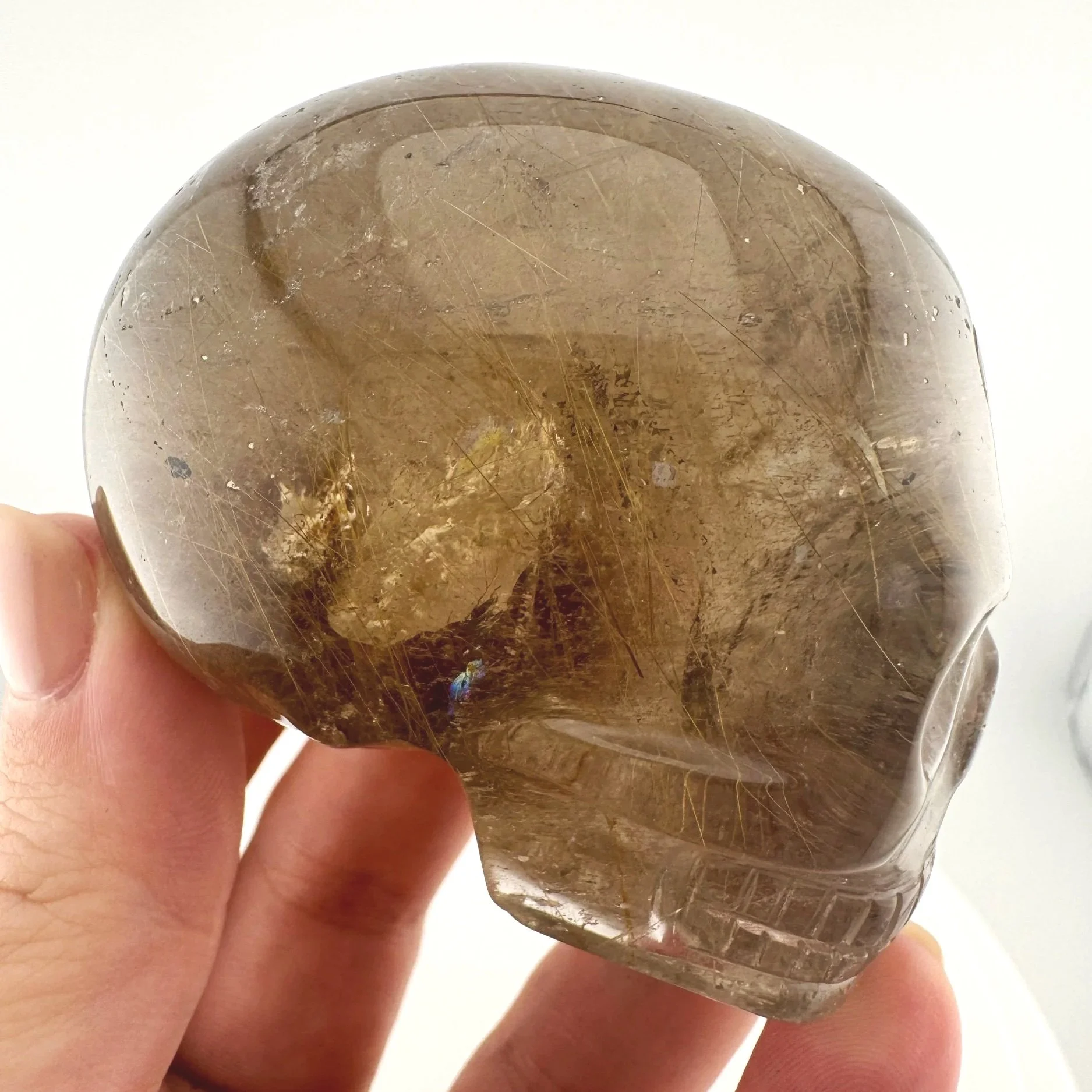 Leandro de Souza Golden Rutile in Smoky Quartz Mayan Skull