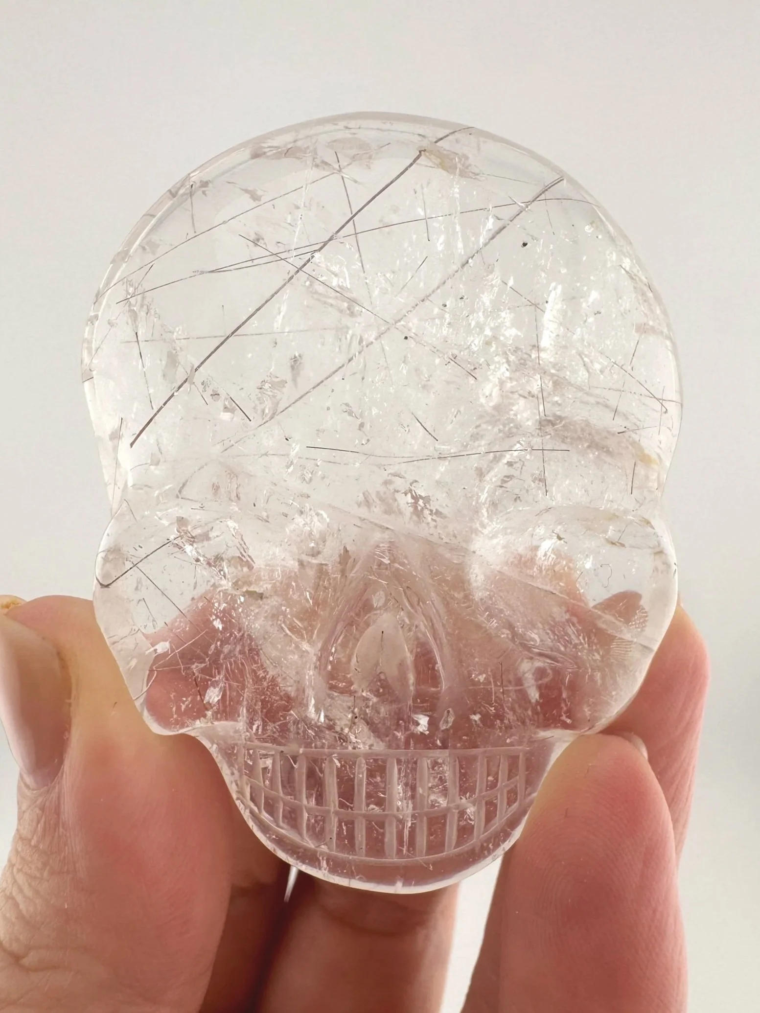 Leandro de Souza Red Rutile in Quartz Magical Child Palm Skull
