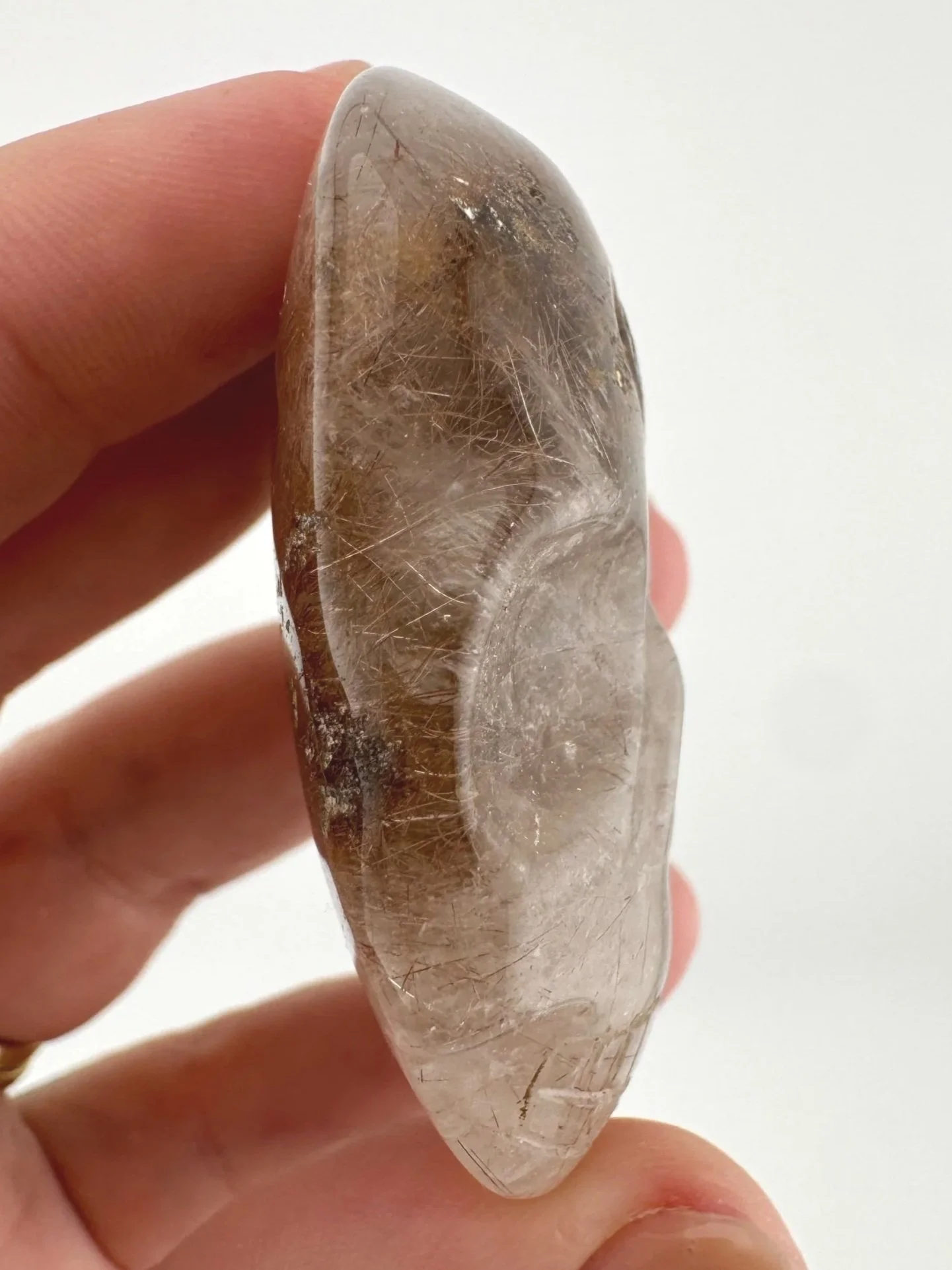 Leandro de Souza Red Rutile in Quartz Palm Skull