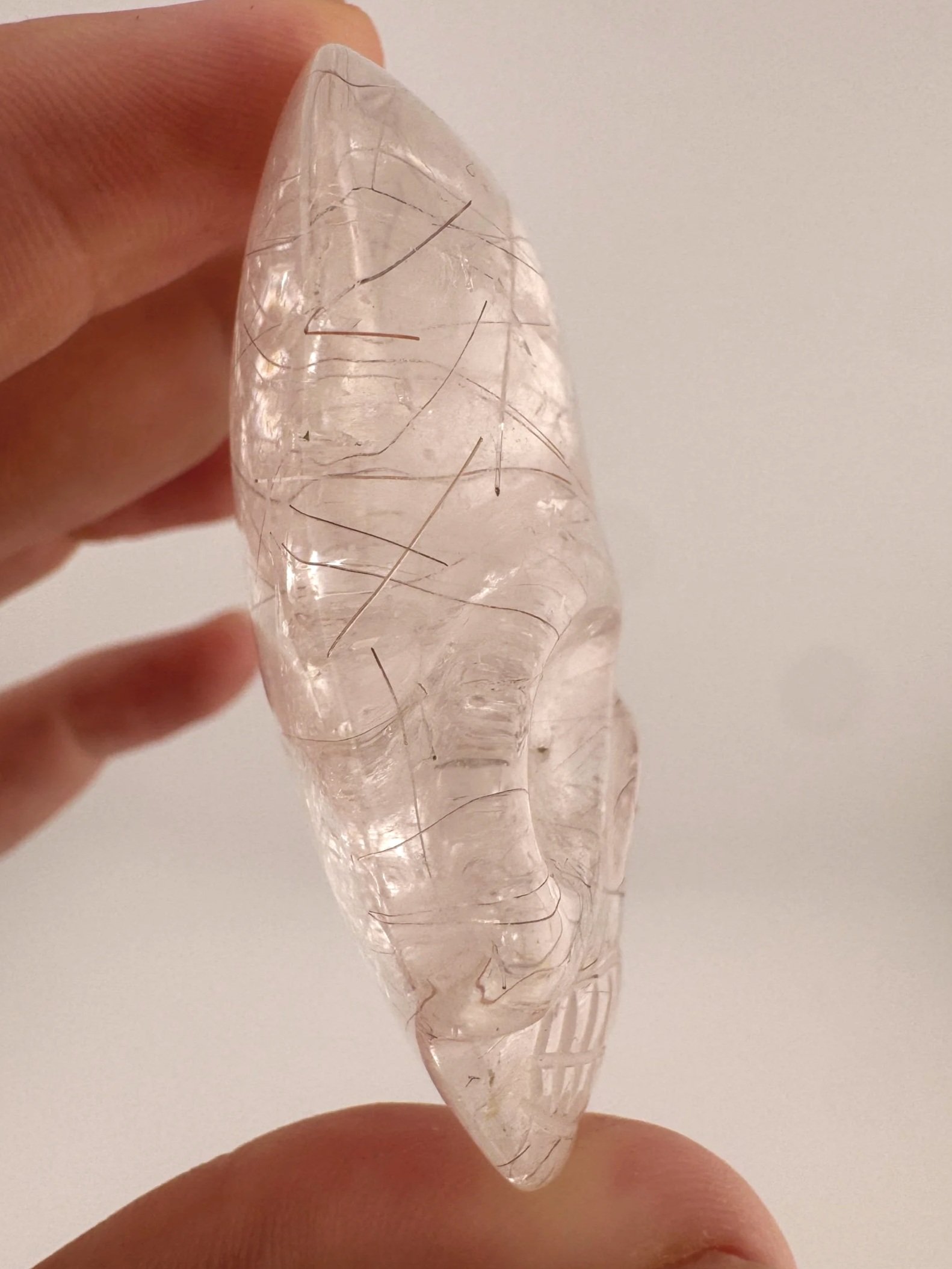 Leandro de Souza Red Rutile in Quartz Magical Child Palm Skull
