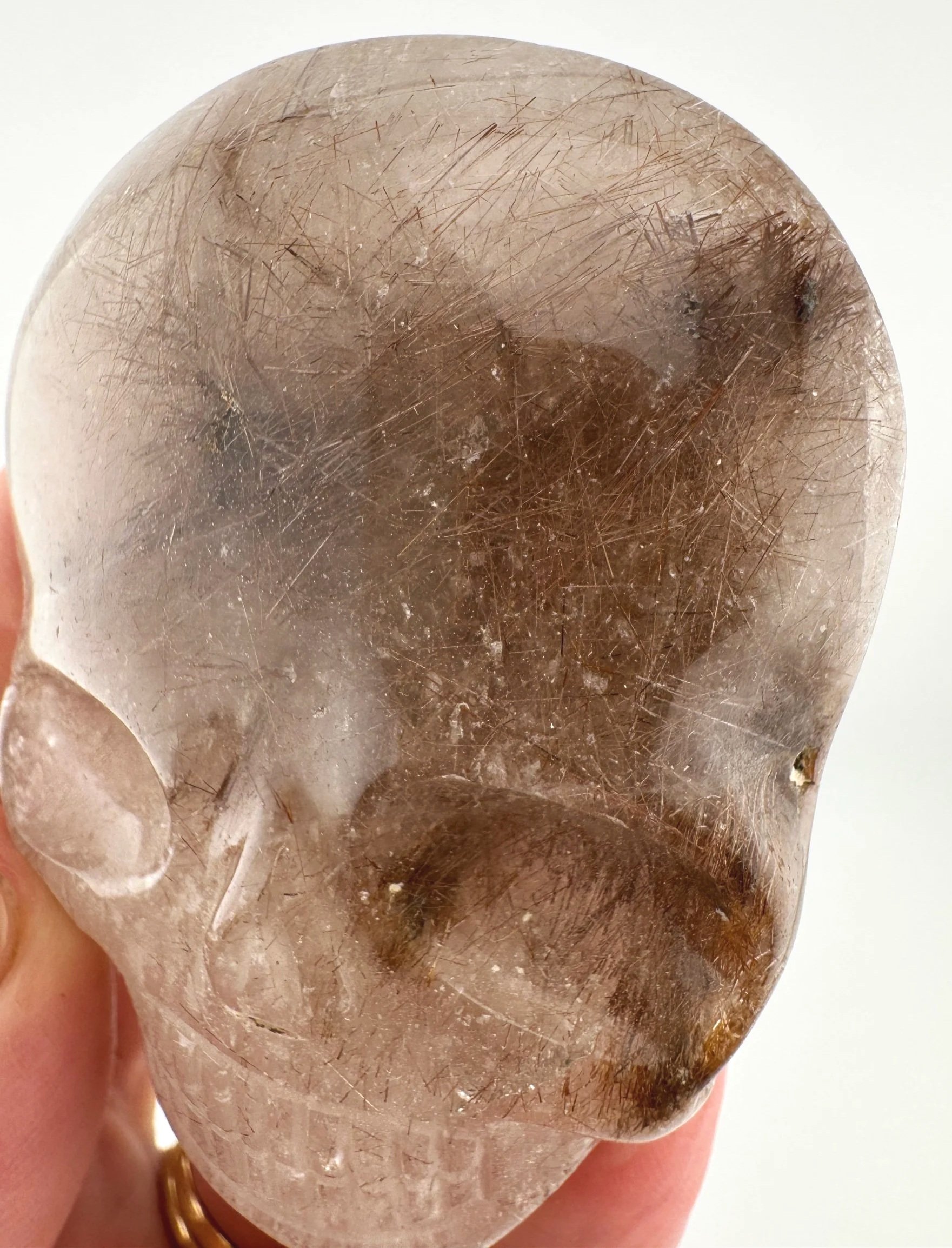 Leandro de Souza Red Rutile in Quartz Palm Skull