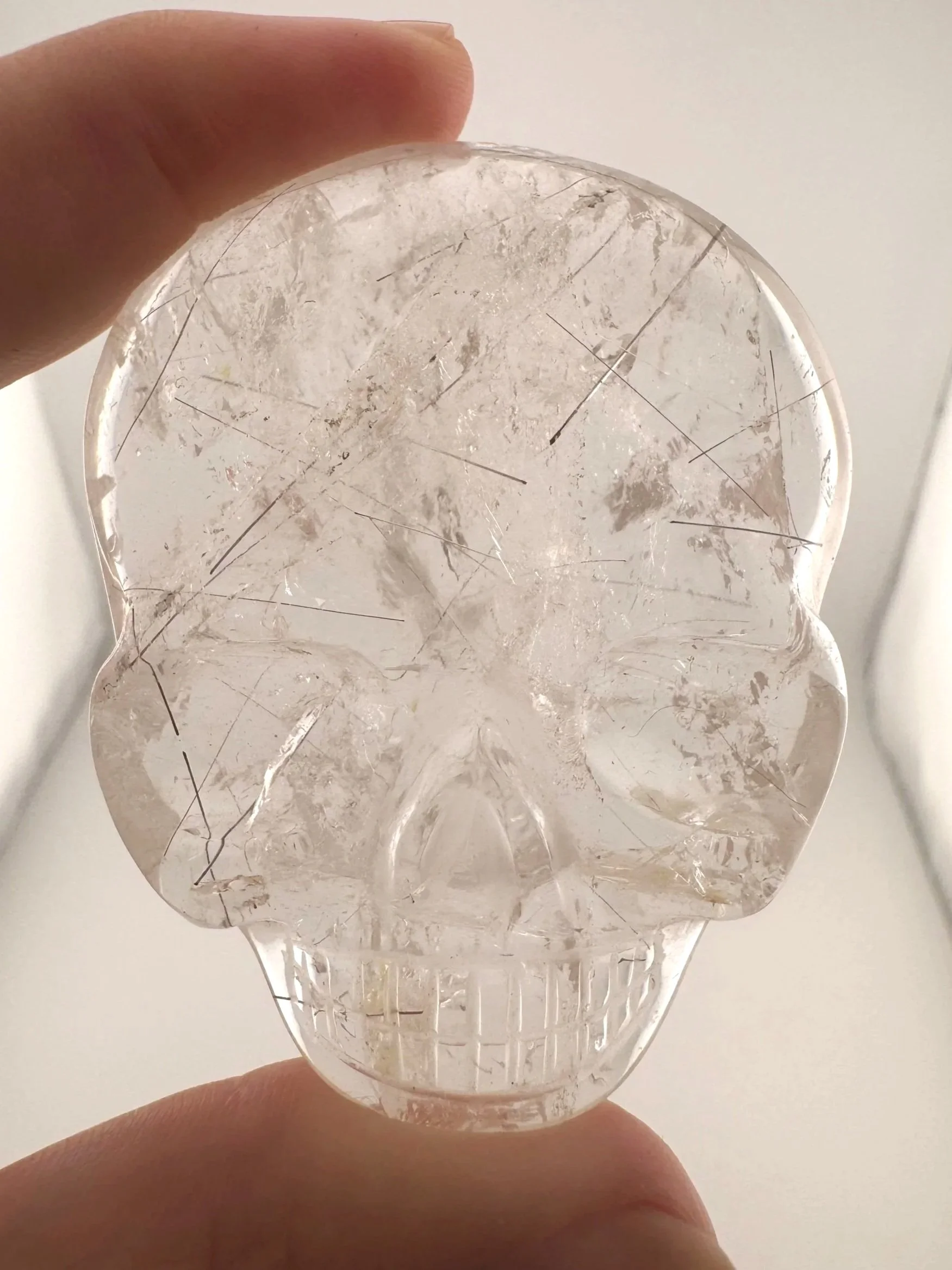 Leandro de Souza Red Rutile in Quartz Magical Child Palm Skull
