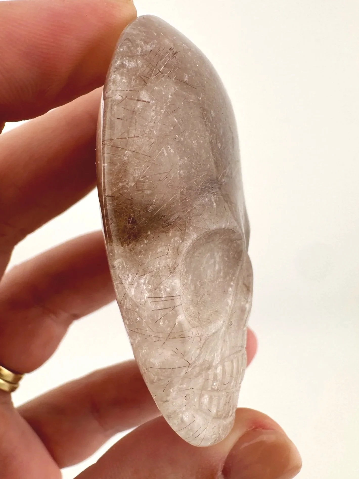 Leandro de Souza Red Rutile in Quartz Palm Skull
