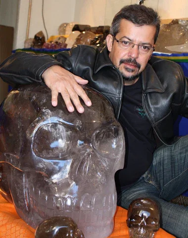 Leandro de Souza pictured with his skull Akator, the largest crystal skull in the world.