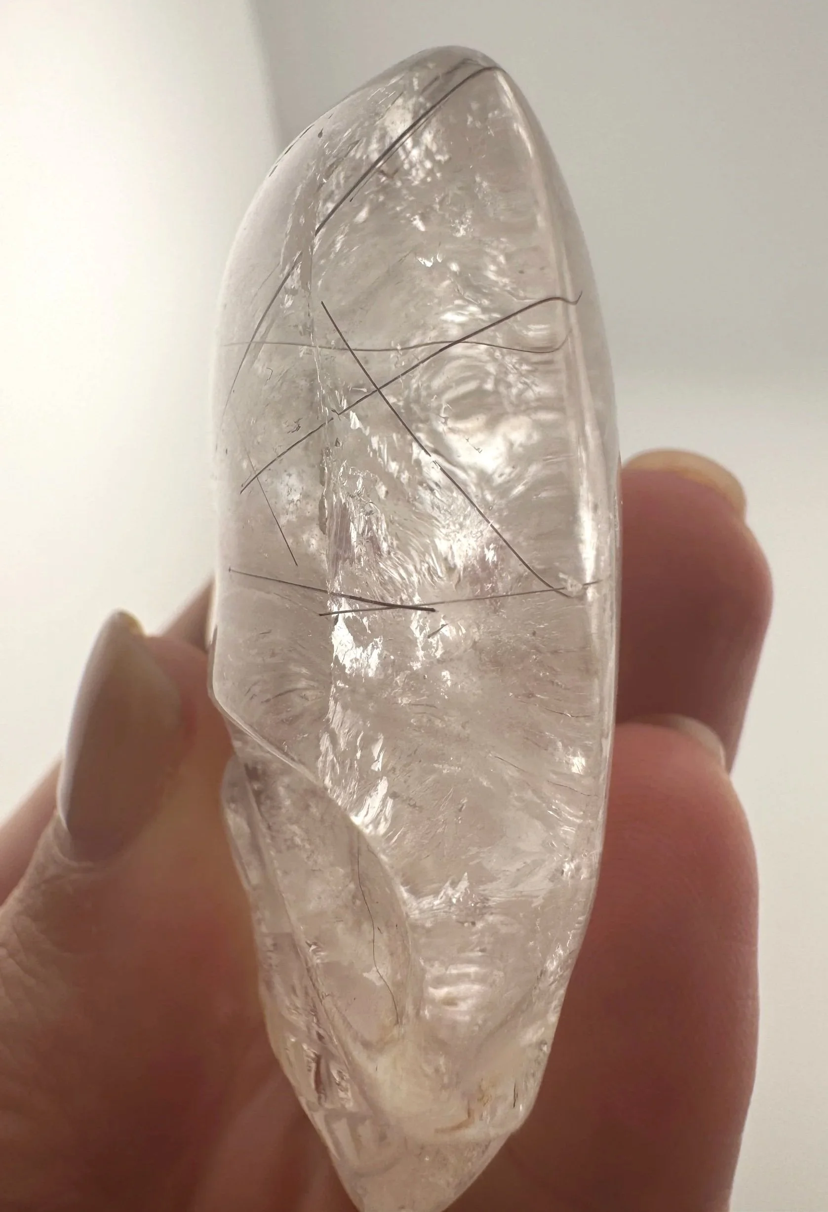 Leandro de Souza Red Rutile in Quartz Magical Child Palm Skull