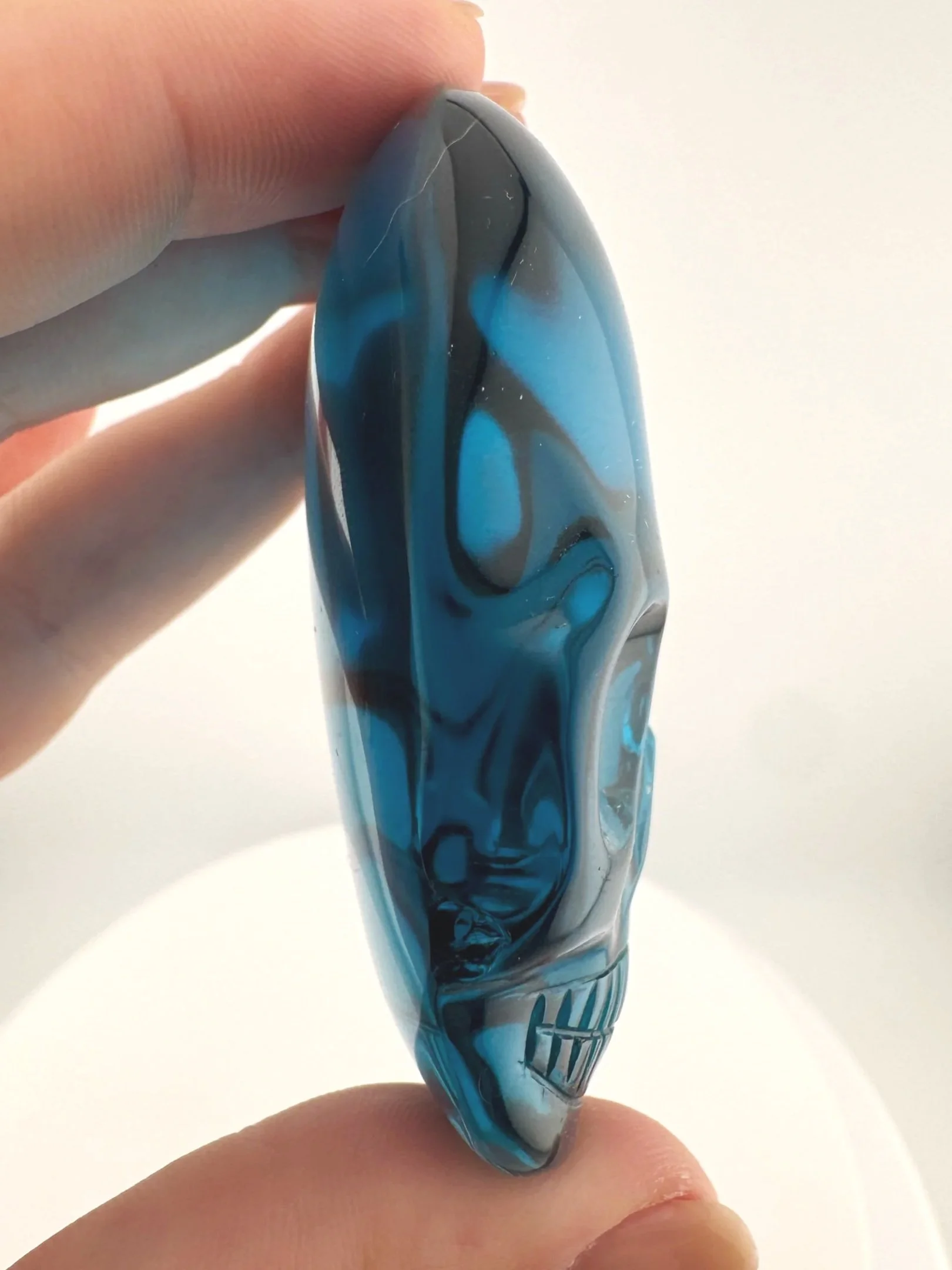 Leandro de Souza Blue Obsidian Magical Child Palm Skull