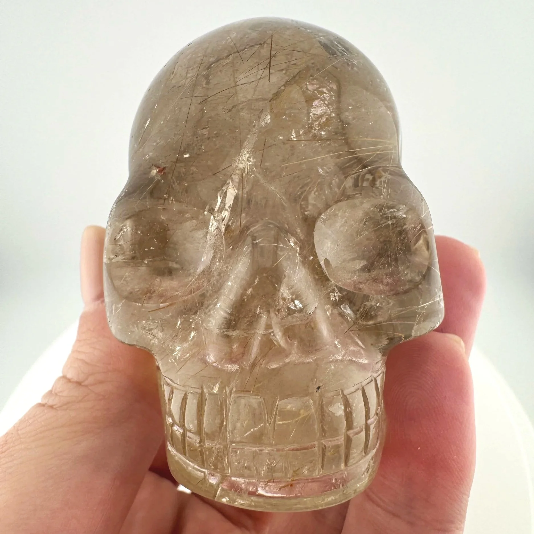 Leandro de Souza Golden Rutile in Smoky Quartz Mayan Skull