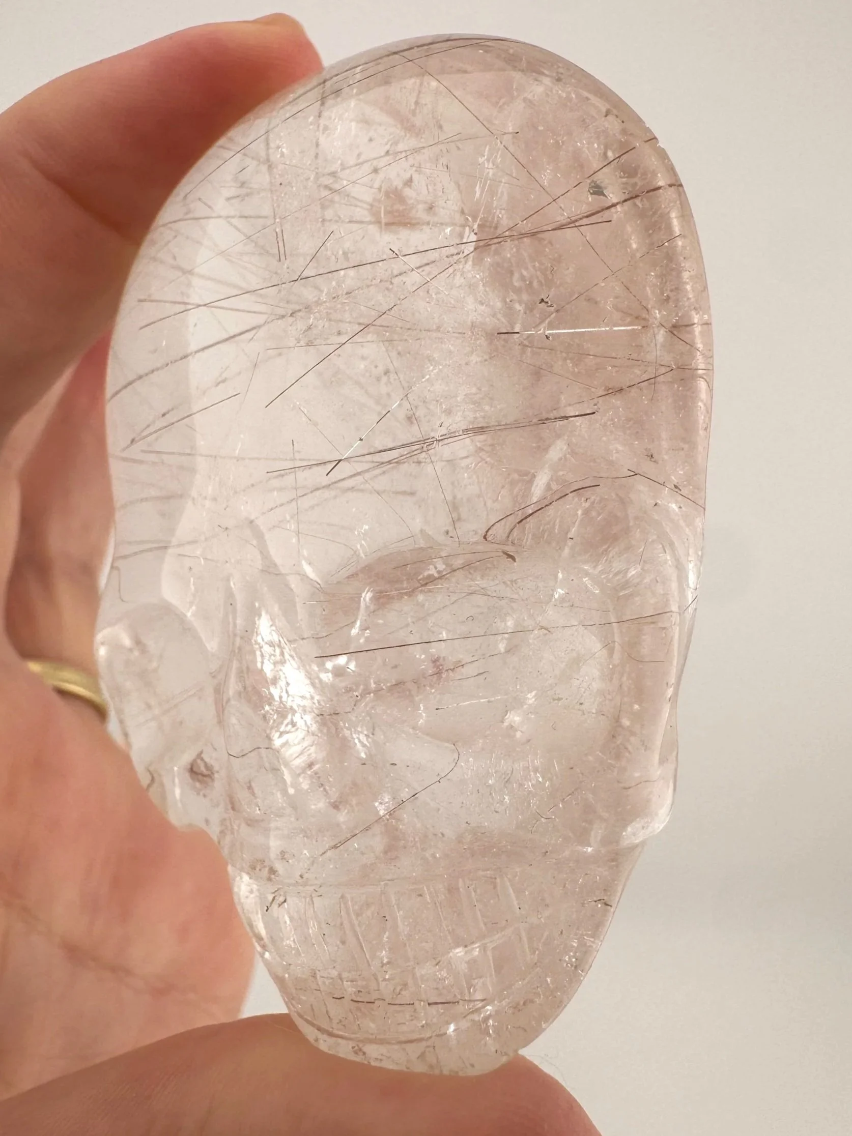 Leandro de Souza Red Rutile in Quartz Magical Child Palm Skull