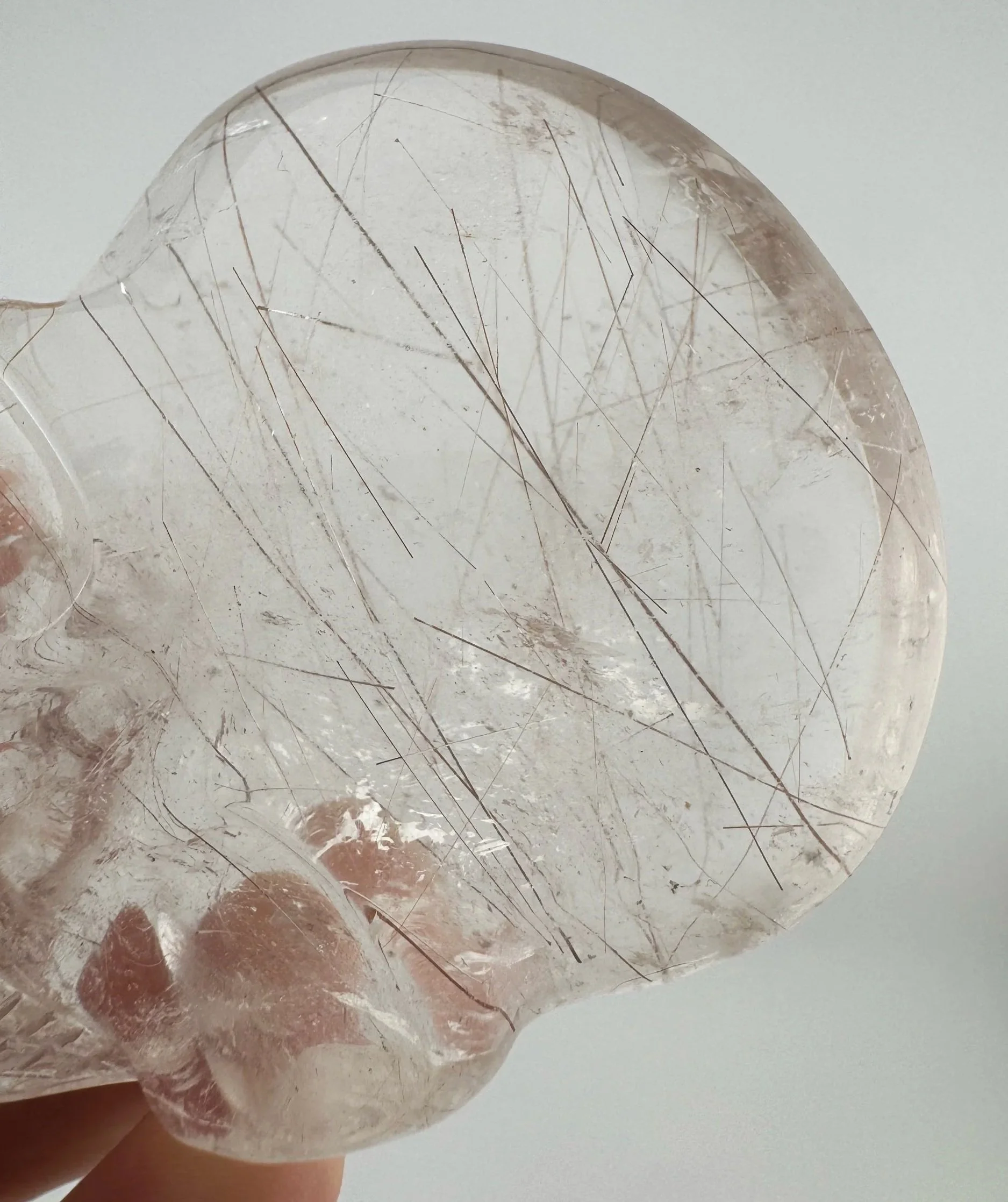 Leandro de Souza Red Rutile in Quartz Magical Child Palm Skull