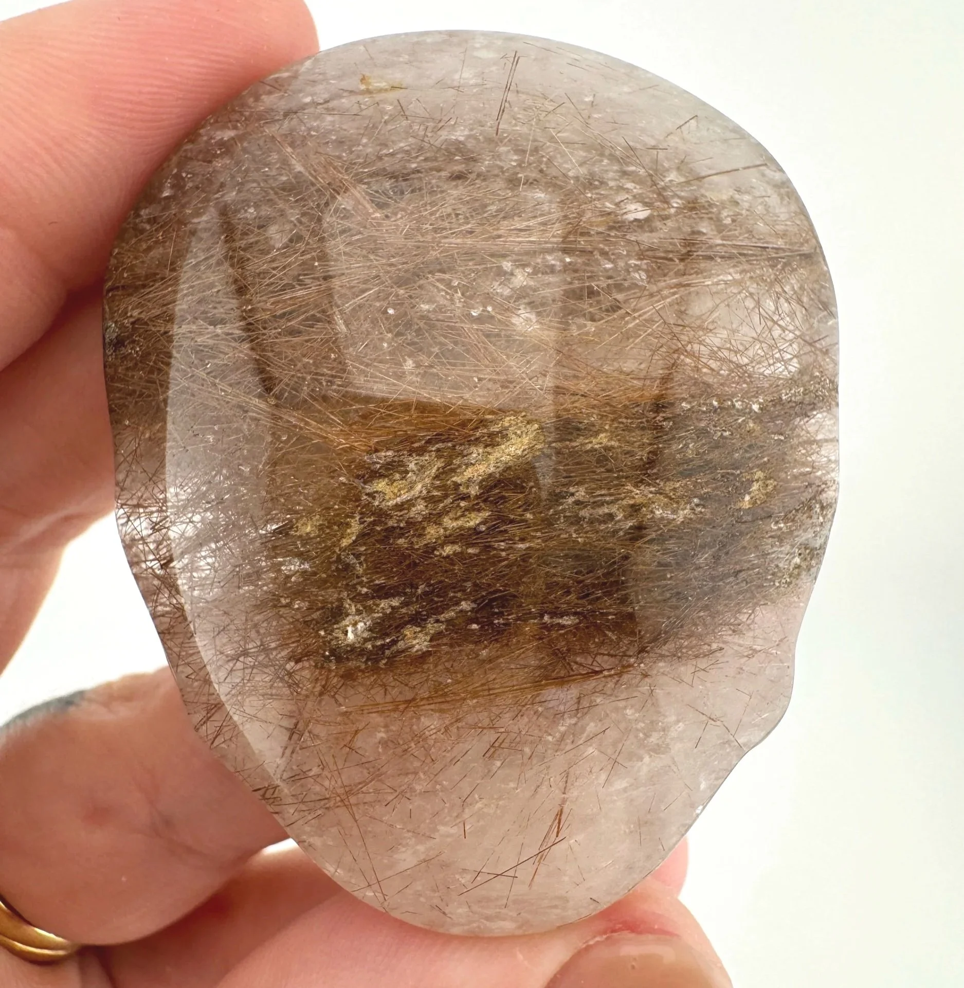 Leandro de Souza Red Rutile in Quartz Palm Skull