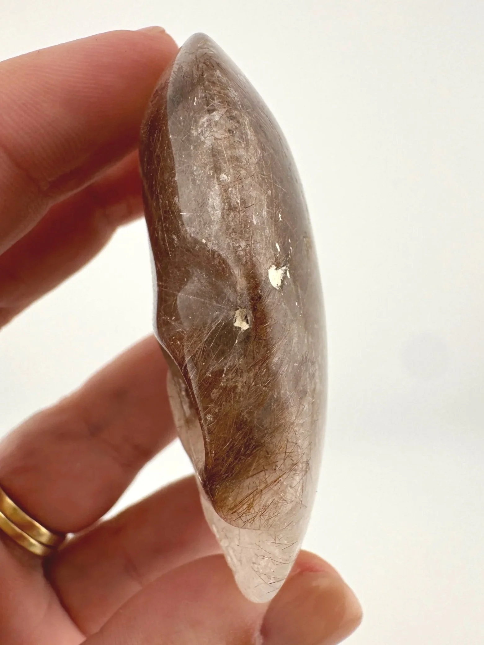 Leandro de Souza Red Rutile in Quartz Palm Skull