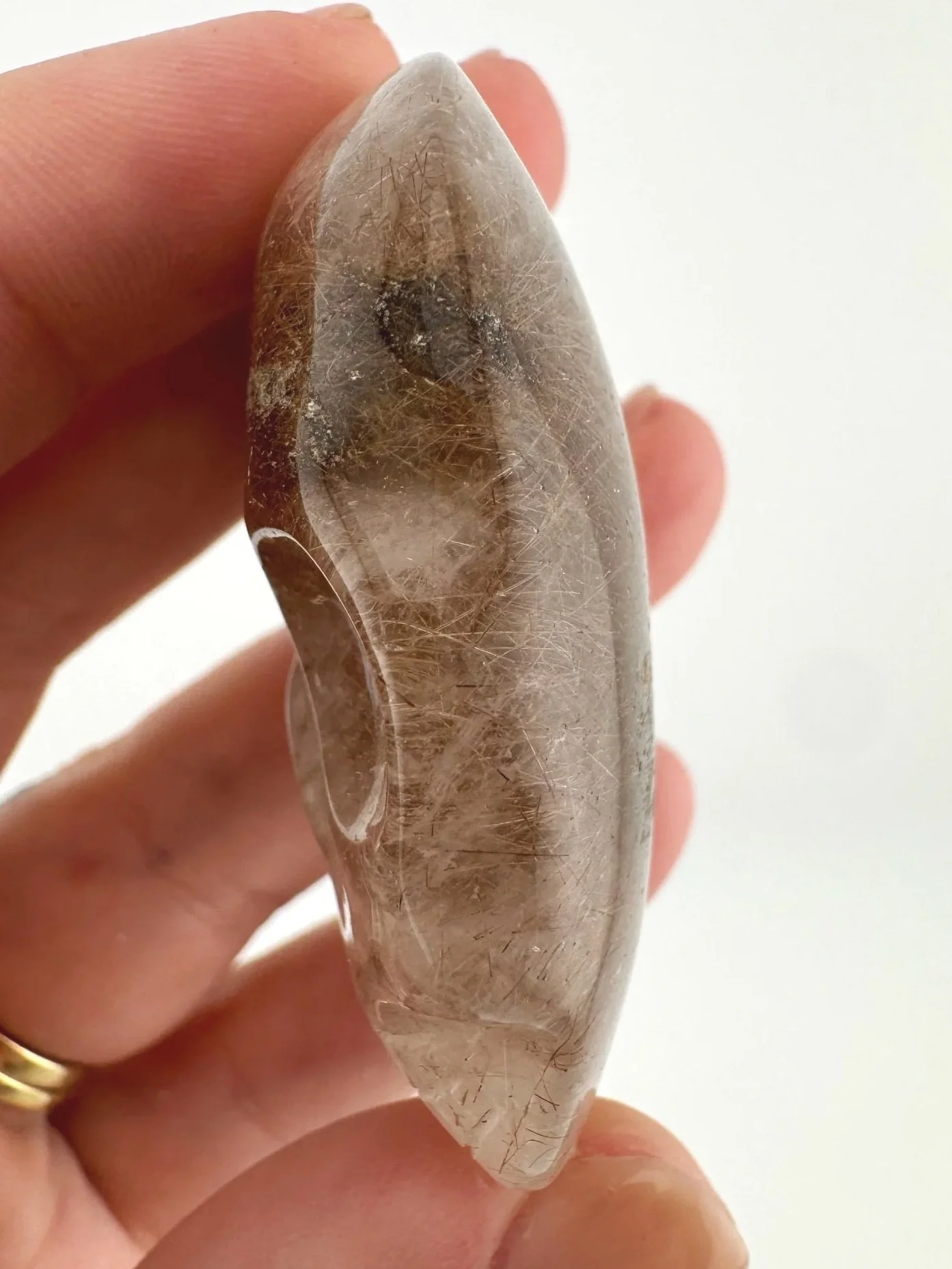 Leandro de Souza Red Rutile in Quartz Palm Skull