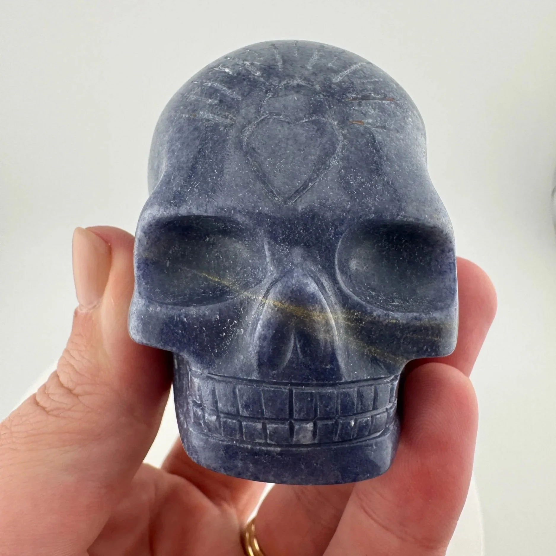 A Blue Aventurine Skull carved by Leandro de Souza