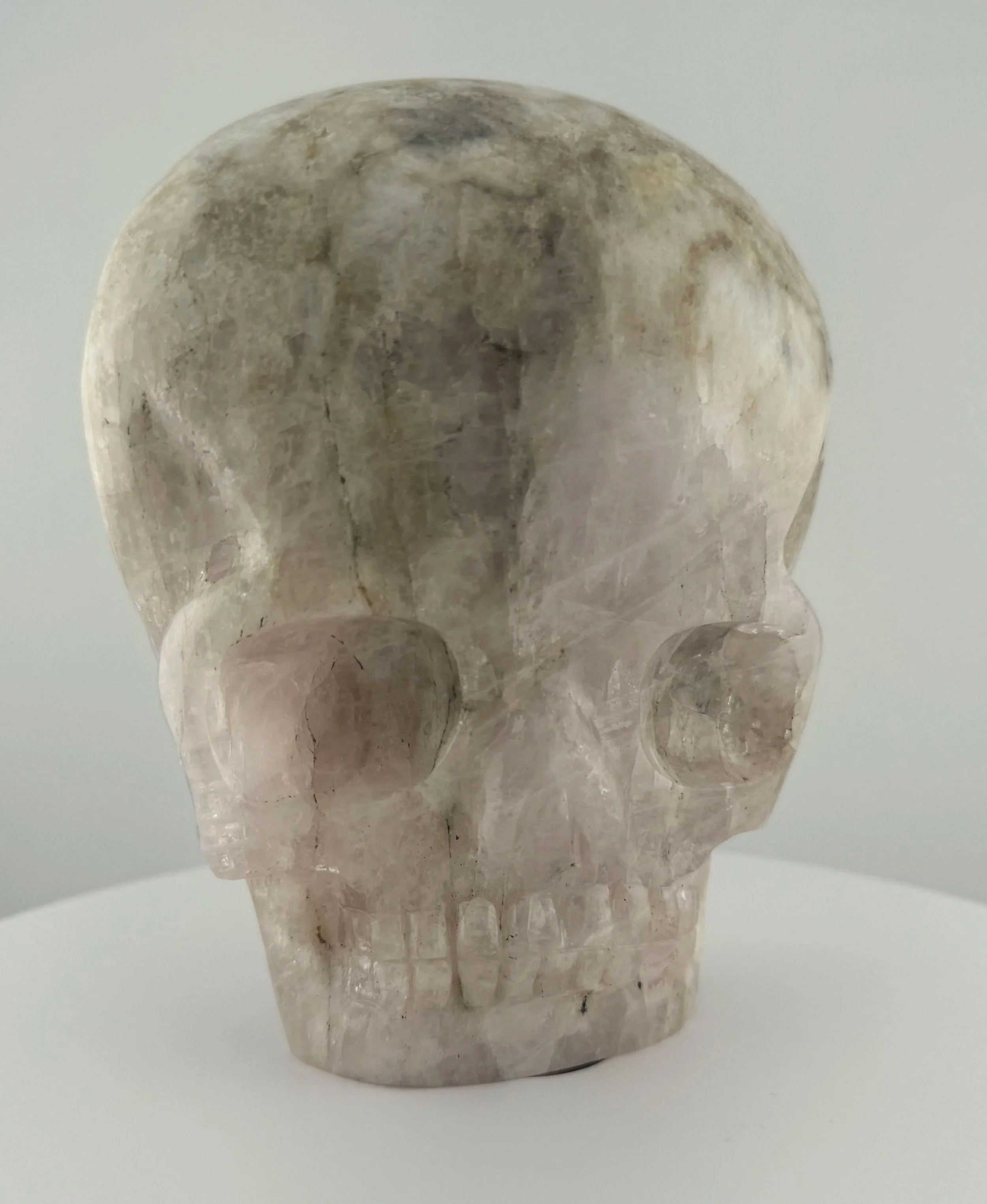 A large Morganite Shaman Skull carved by Leandro de Souza.