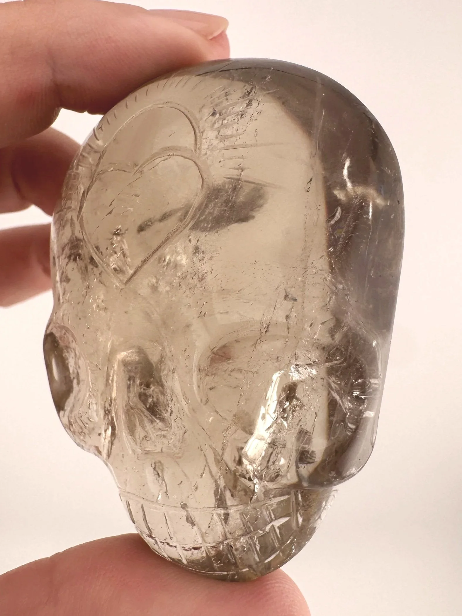Leandro de Souza Golden Rutile in Quartz Magical Child Palm Skull