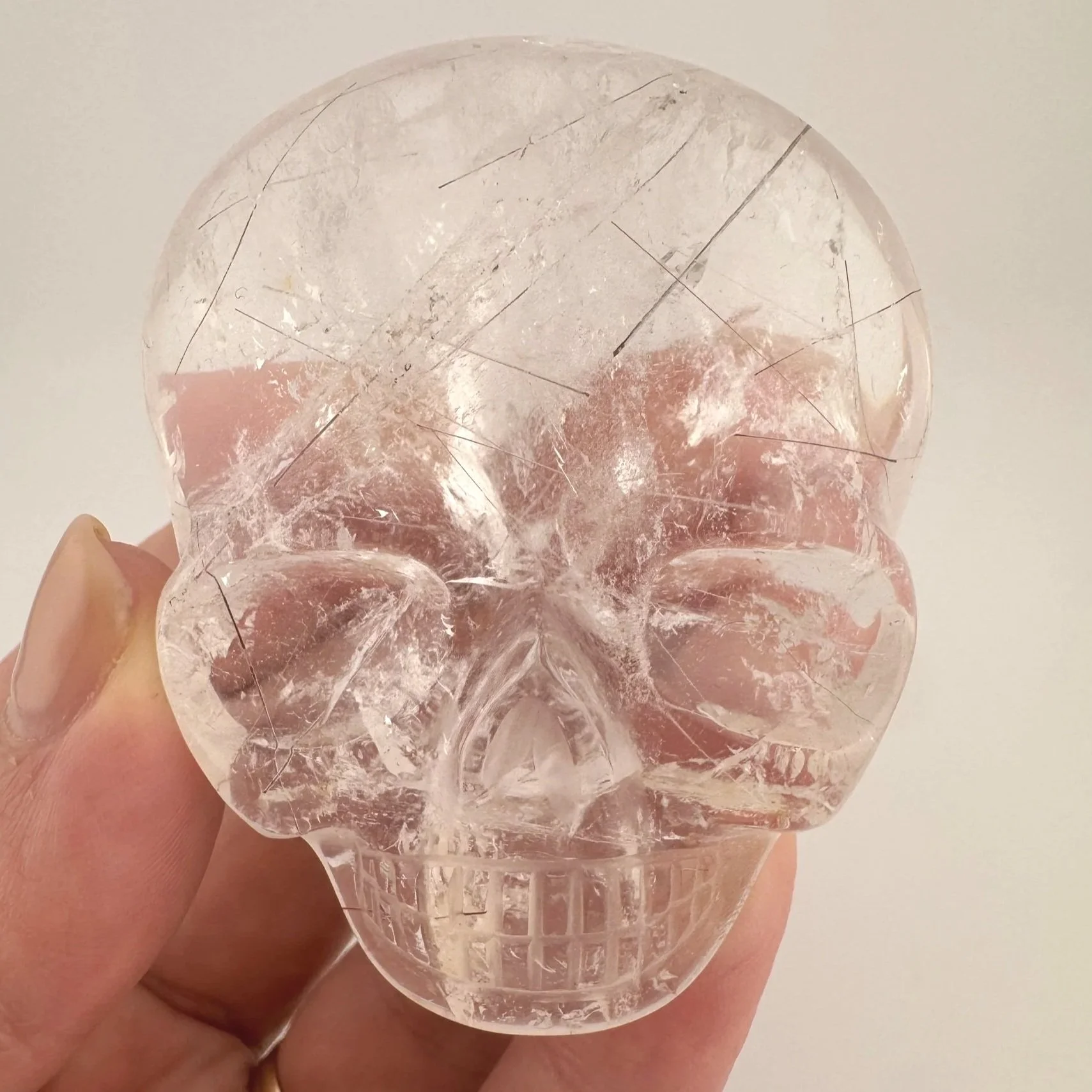 Leandro de Souza Red Rutile in Quartz Magical Child Palm Skull