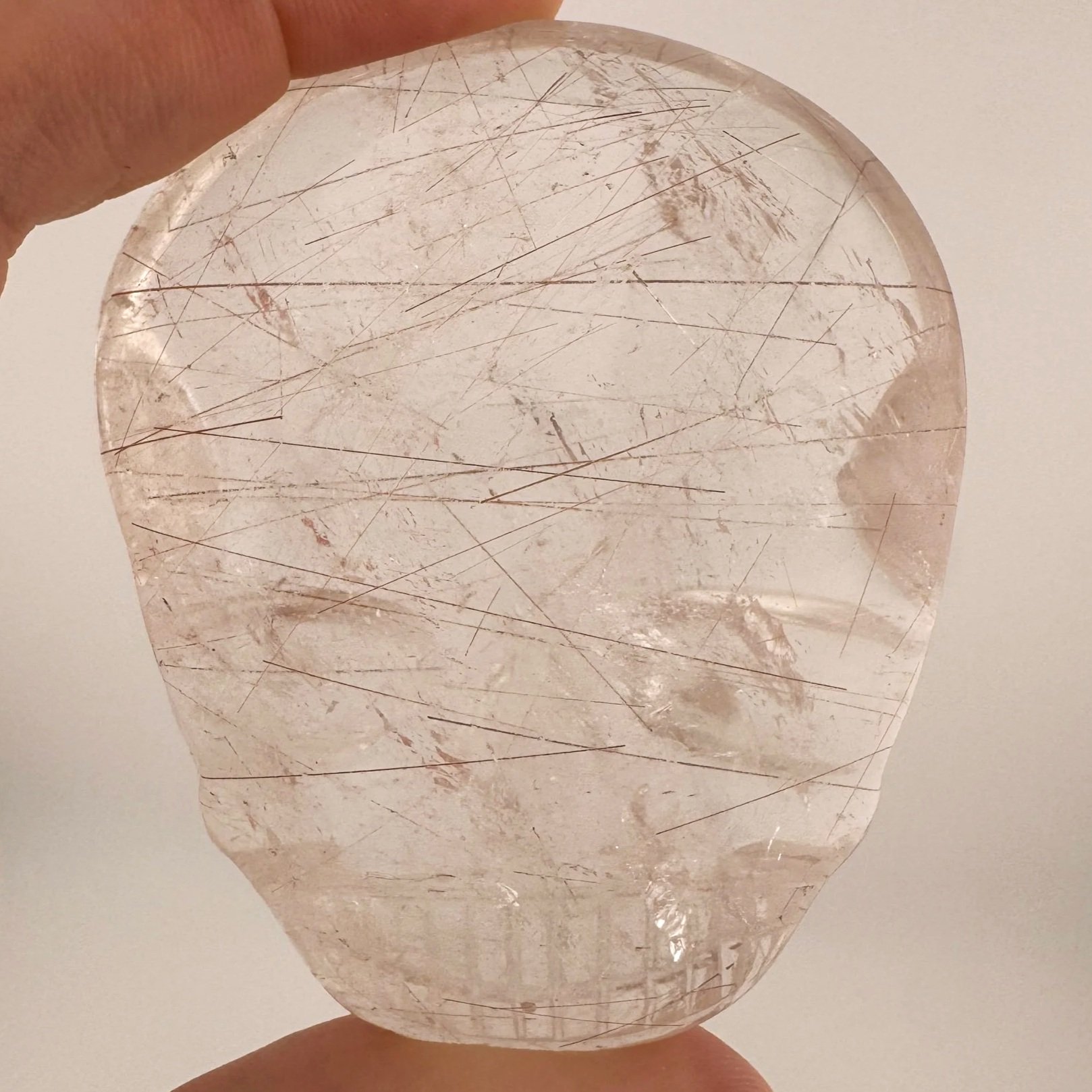 Leandro de Souza Red Rutile in Quartz Magical Child Palm Skull