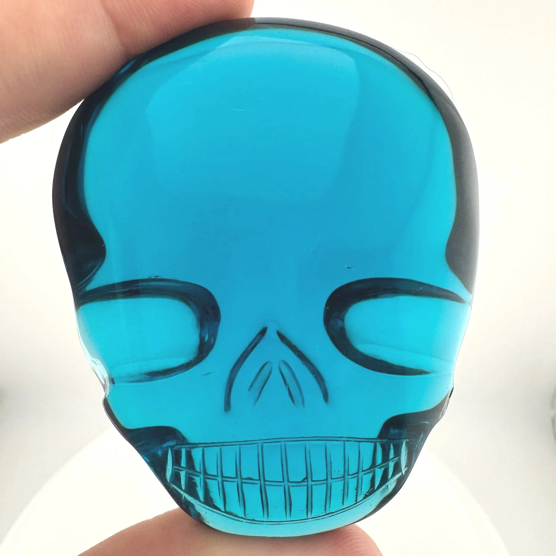 Leandro de Souza Blue Obsidian Magical Child Palm Skull