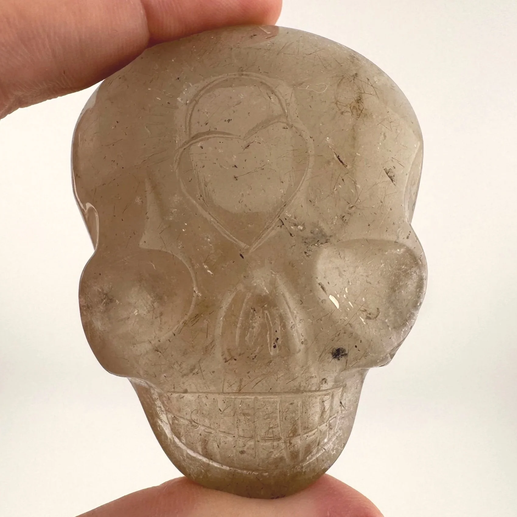 Leandro de Souza Golden Rutile in Quartz Magical Child Palm Skull