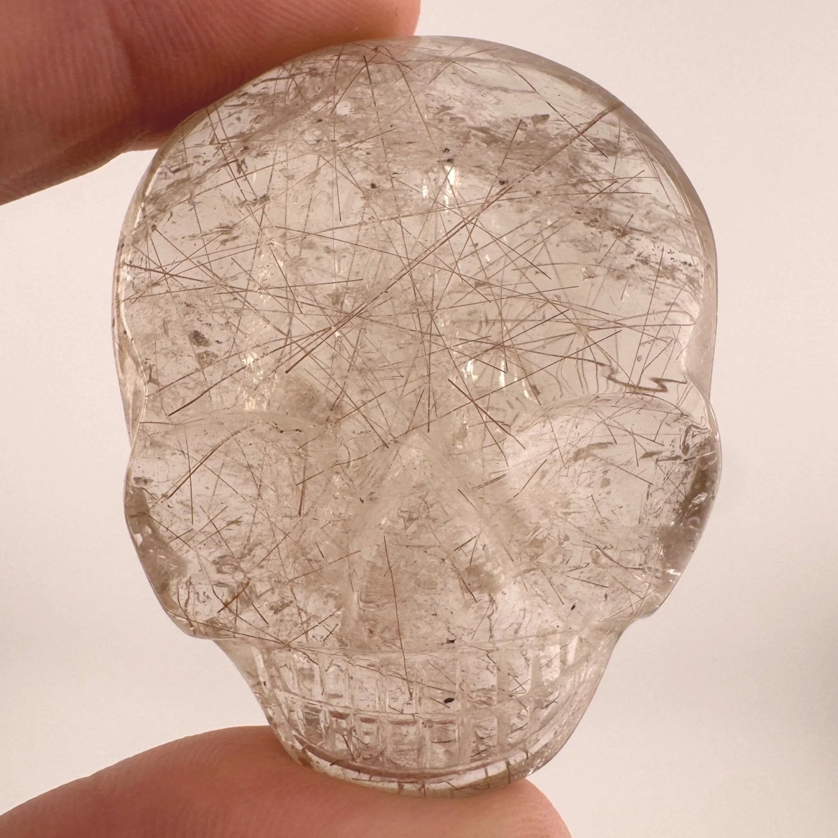 Leandro de Souza red Rutile in Gem Quartz Magical Child Palm Skull